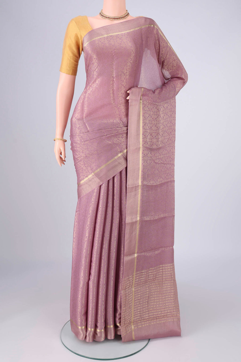 Lavender Mysore Crepe Saree with Zari Brocade on the body and Zari Border.  displayed on a mannequin