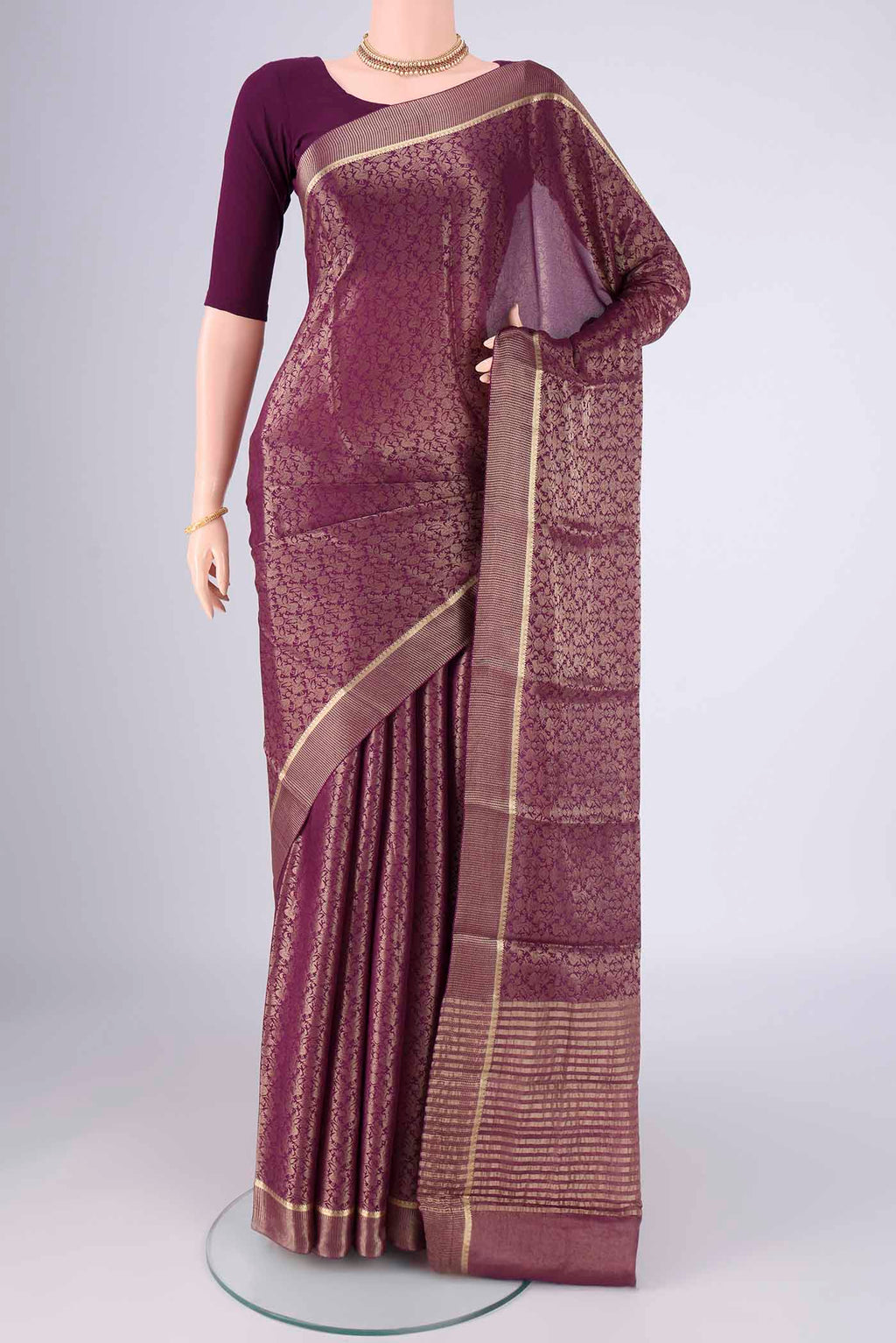 Purple Mysore Crepe Saree with Zari Brocade on the body and Zari Border.  displayed on a mannequin