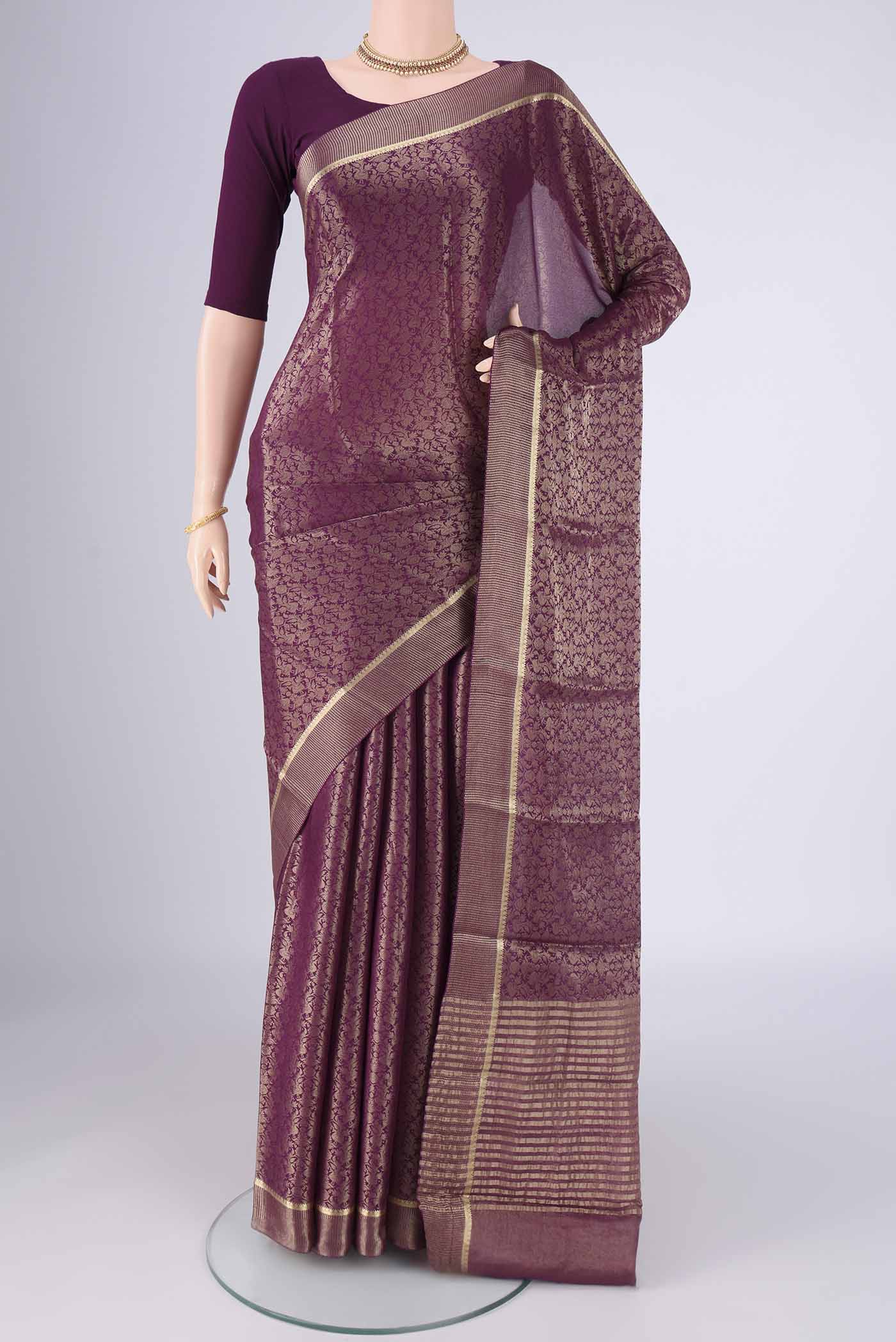 Purple Mysore Crepe Saree with Zari Brocade on the body and Zari Border.  displayed on a mannequin