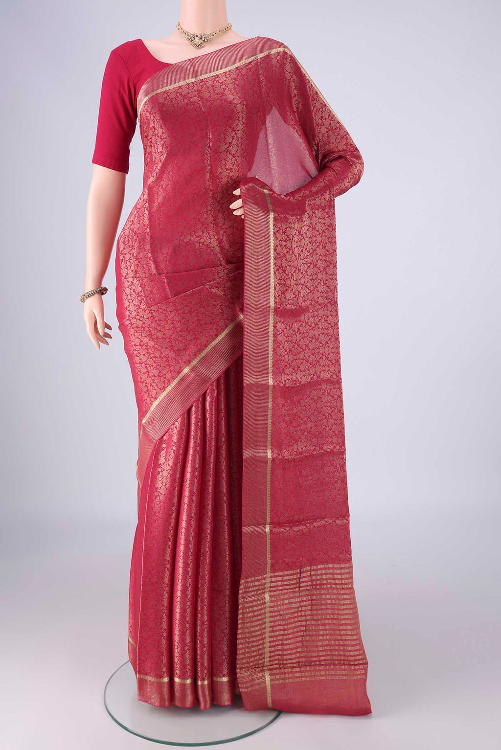 Dark Pink Mysore Crepe Saree with Zari Brocade on the body and Zari Border.  displayed on a mannequin