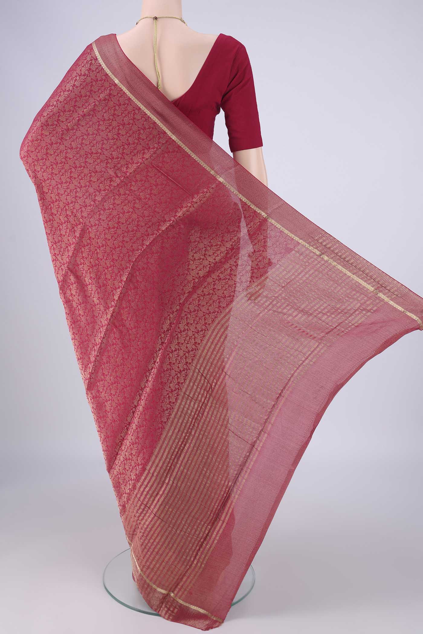 Flat view of Dark Pink Mysore Crepe Saree with Zari Brocade on the body and Zari Border. 