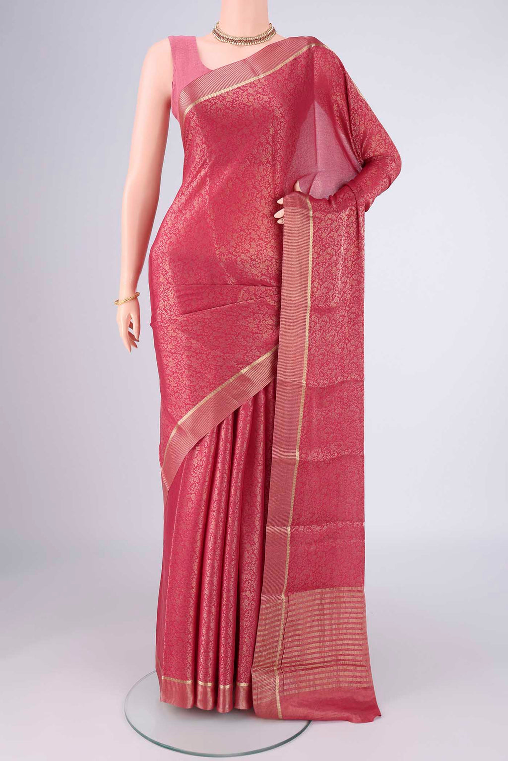 Pink Mysore Crepe Saree with Zari Brocade on the body and Zari Border.  displayed on a mannequin