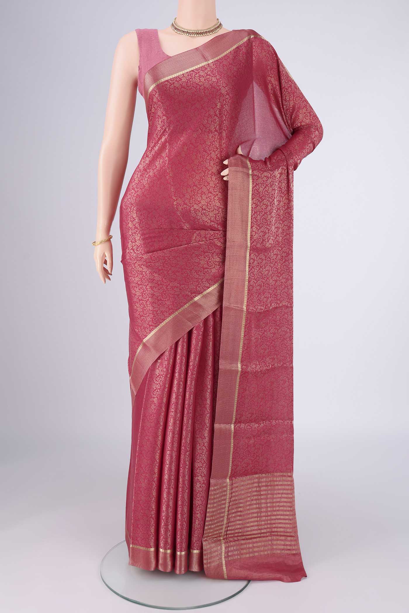 Pink Mysore Crepe Saree with Zari Brocade on the body and Zari Border.  displayed on a mannequin