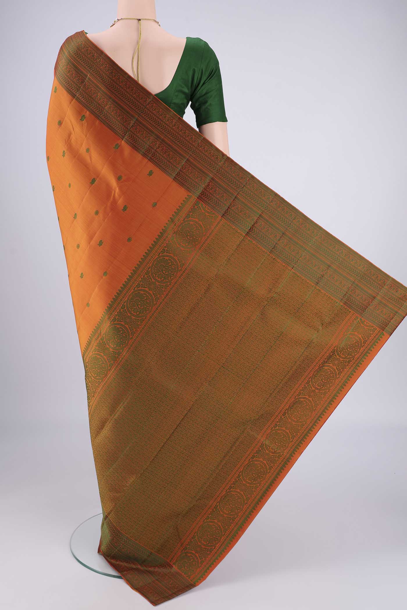 Flat view of Mustard Kanchipuram Silk Saree with Thread Butta on the body and Thread Border. 