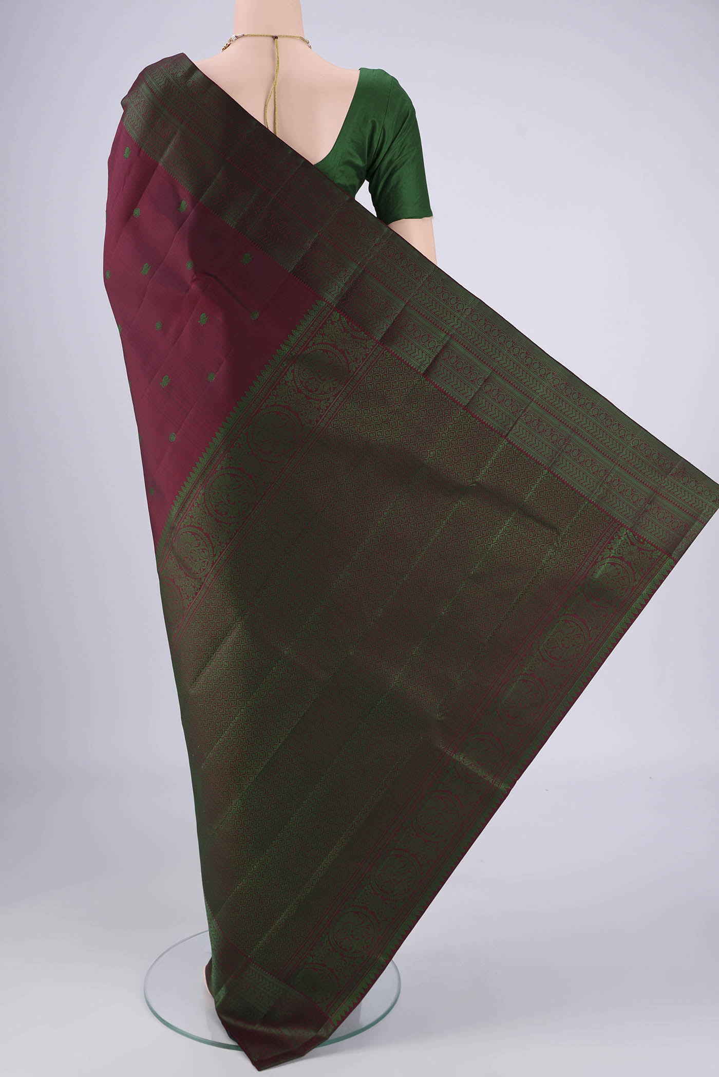 Flat view of Coffee Brown Kanchipuram Silk Saree with Thread Butta on the body and Thread Border. 