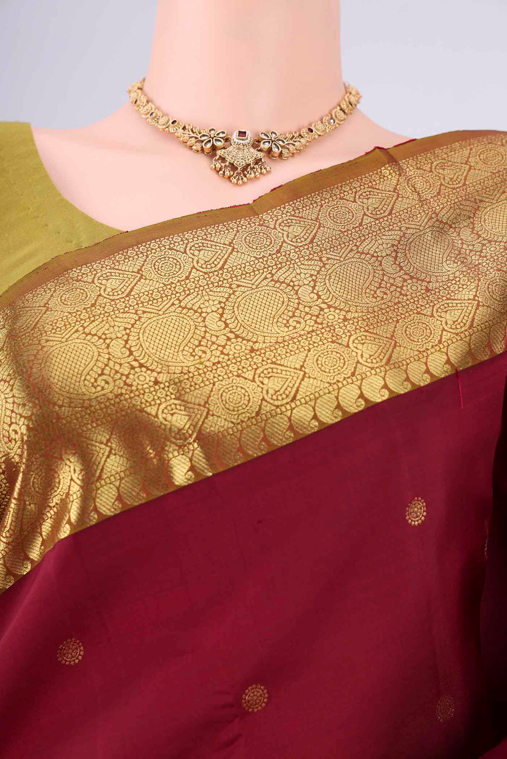 Border image of Pure Silk Pure Zari Maroon Kanchipuram Saree with Zari Butta on the body and Zari Border. 