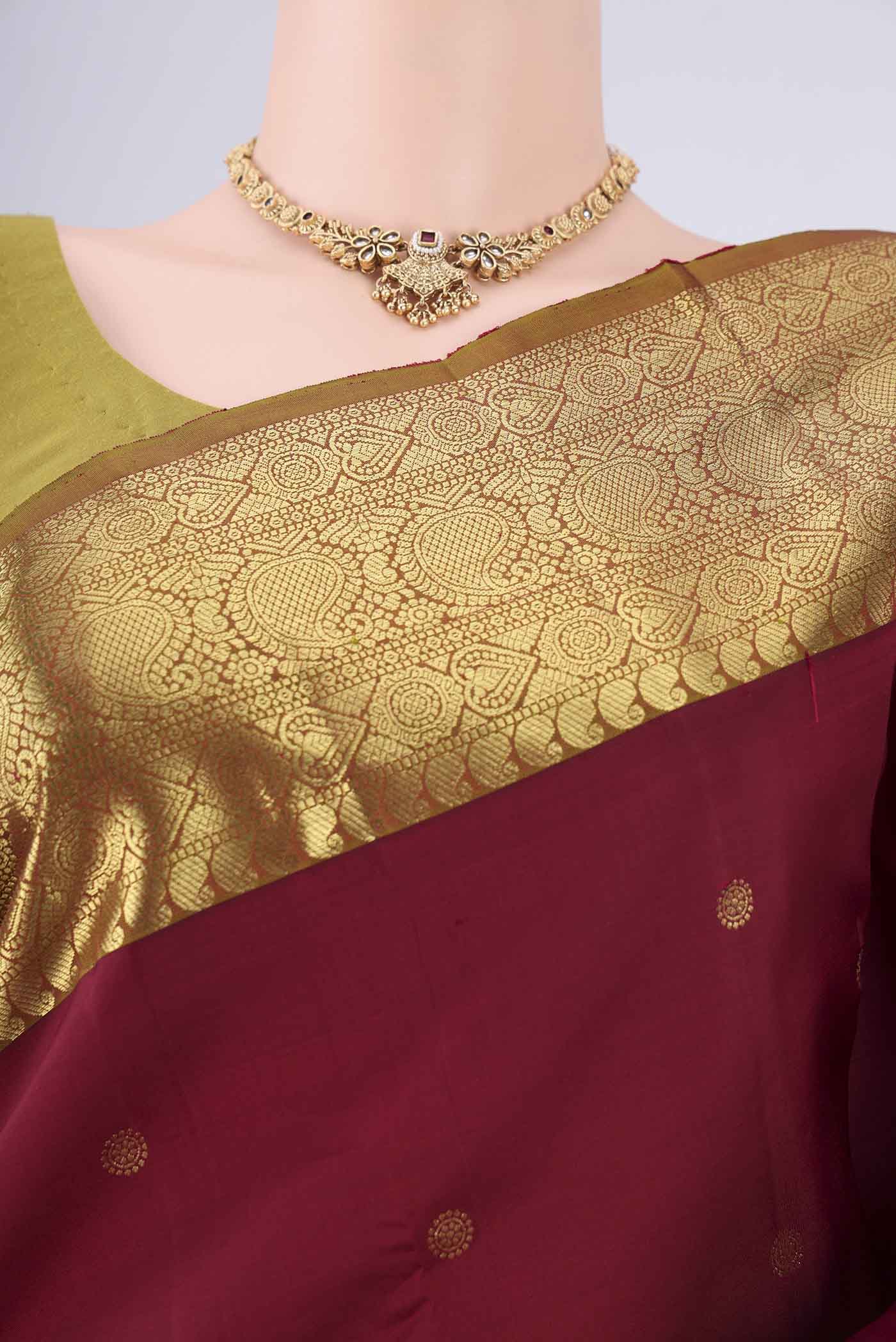 Border image of Pure Silk Pure Zari Maroon Kanchipuram Saree with Zari Butta on the body and Zari Border. 
