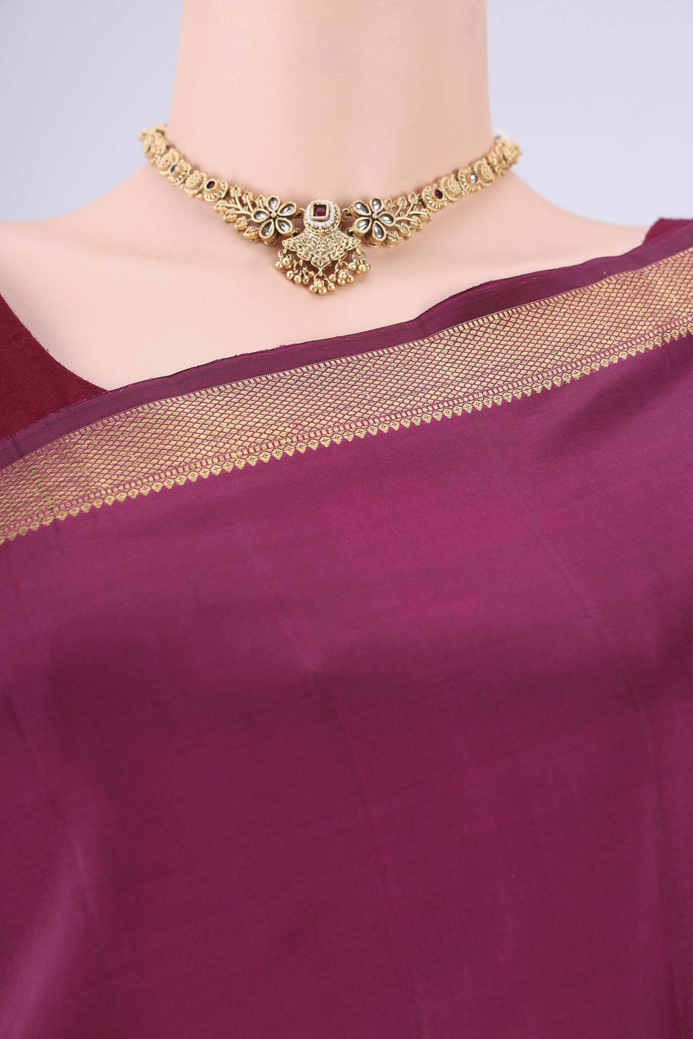 Border image of Pure Silk Pure Zari Magenta Kanchipuram Saree with Zari Butta on the body and Zari Border. 