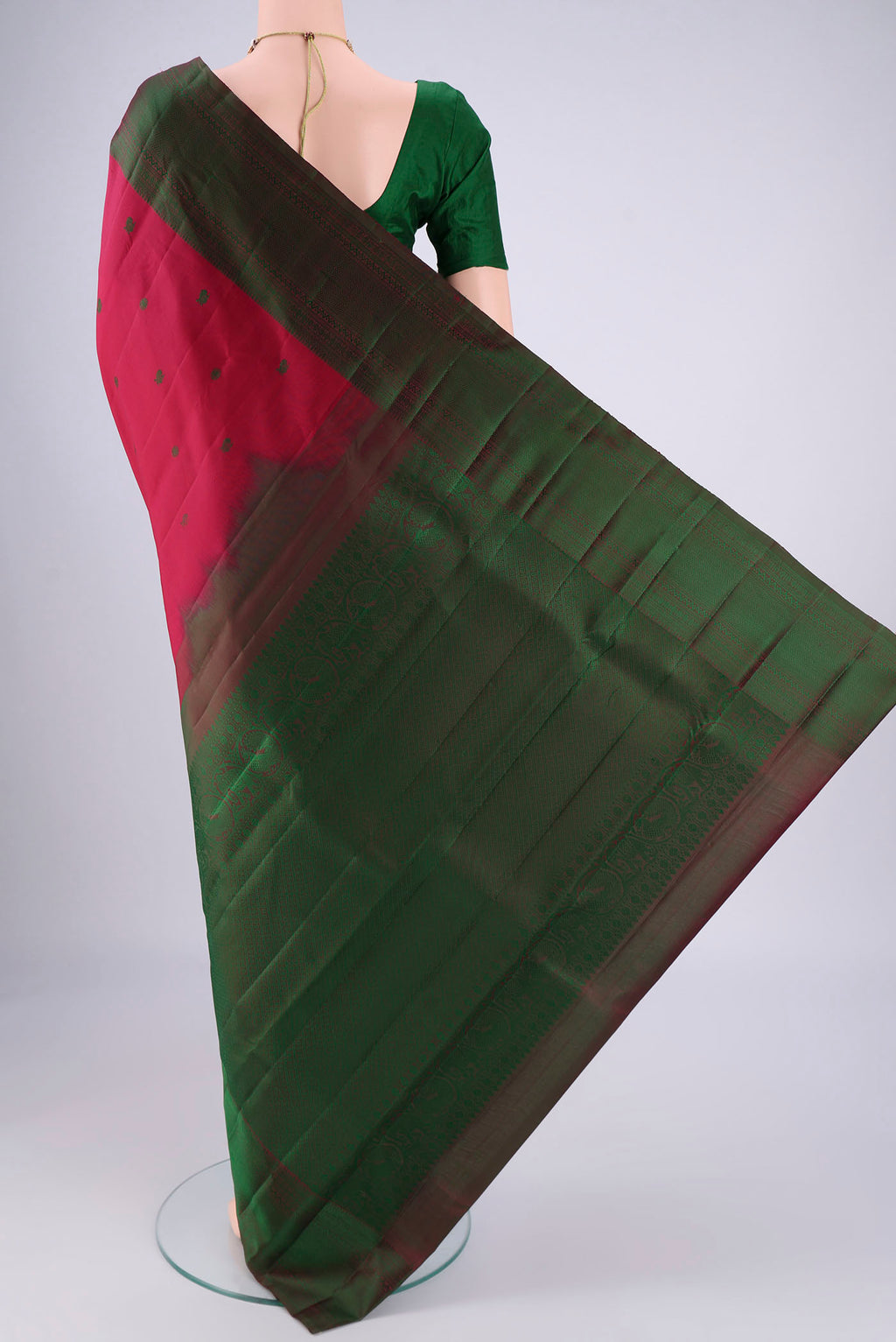 Flat view of Maroon Kanchipuram Silk Saree with Thread Butta on the body and Thread Border. 