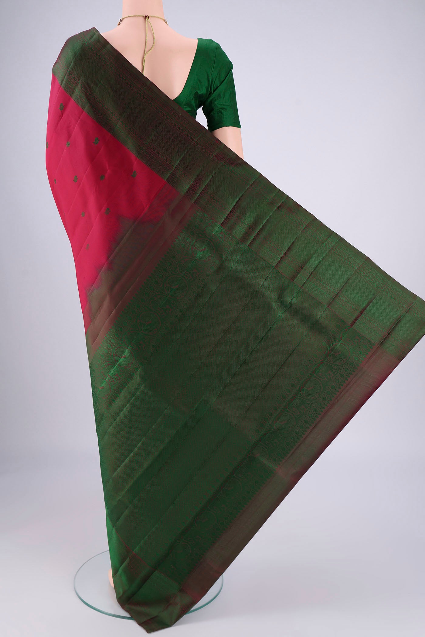Flat view of Maroon Kanchipuram Silk Saree with Thread Butta on the body and Thread Border. 