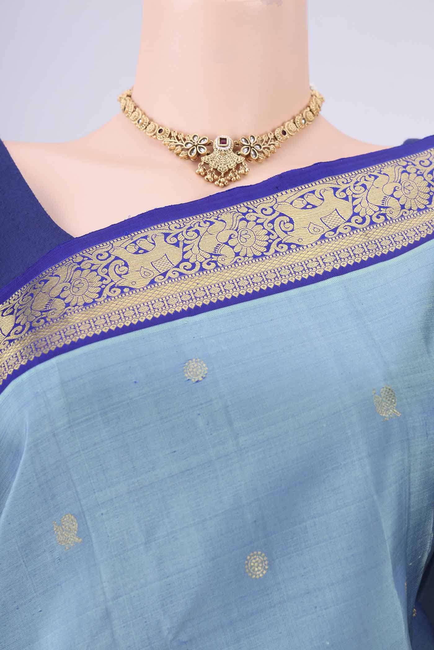 Border image of Pure Silk Pure Zari Sky Blue Kanchipuram Saree with Zari Butta on the body and Zari Border. 