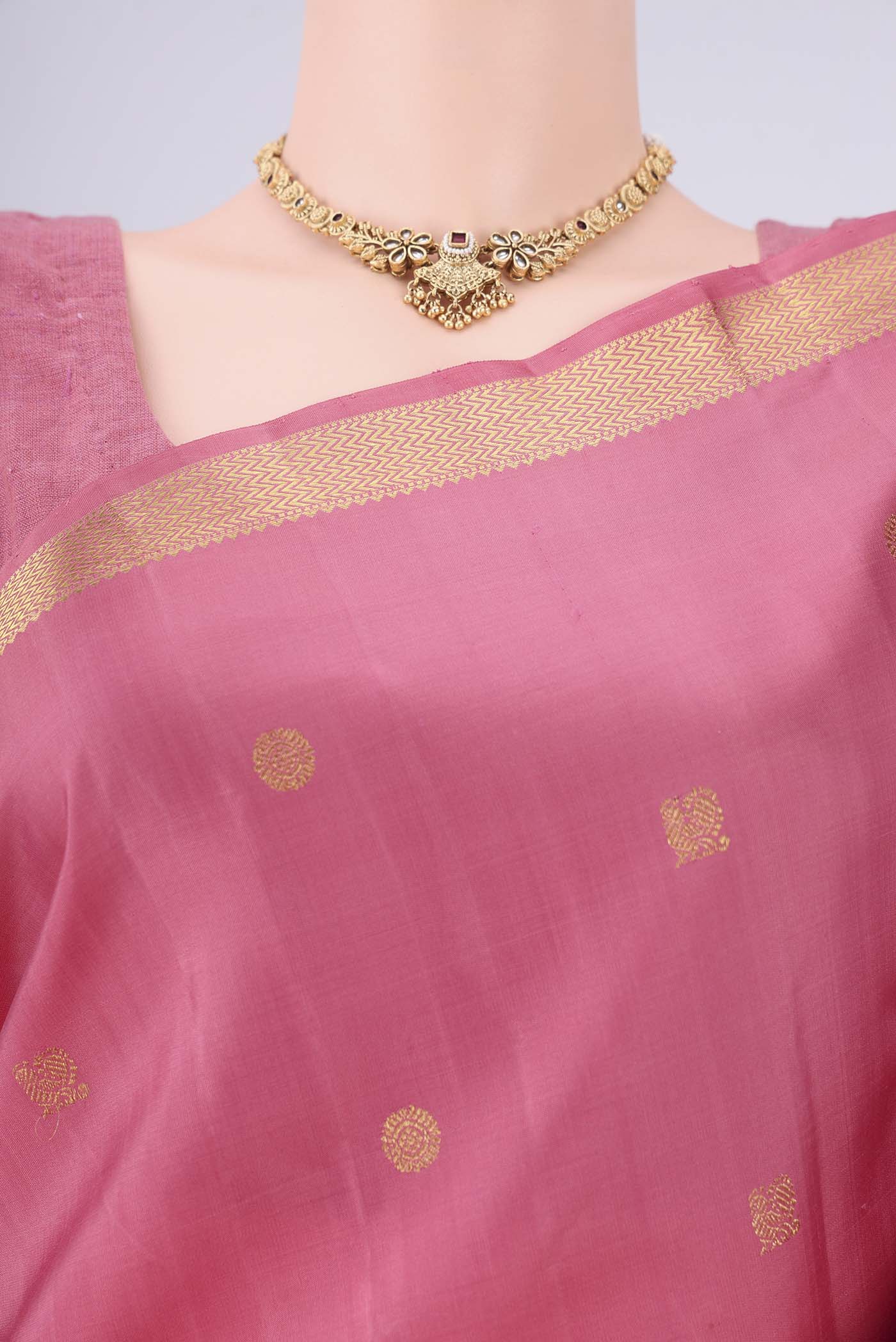Border image of Pure Silk Pure Zari Pink Kanchipuram Saree with Zari Butta on the body and Zari Border. 
