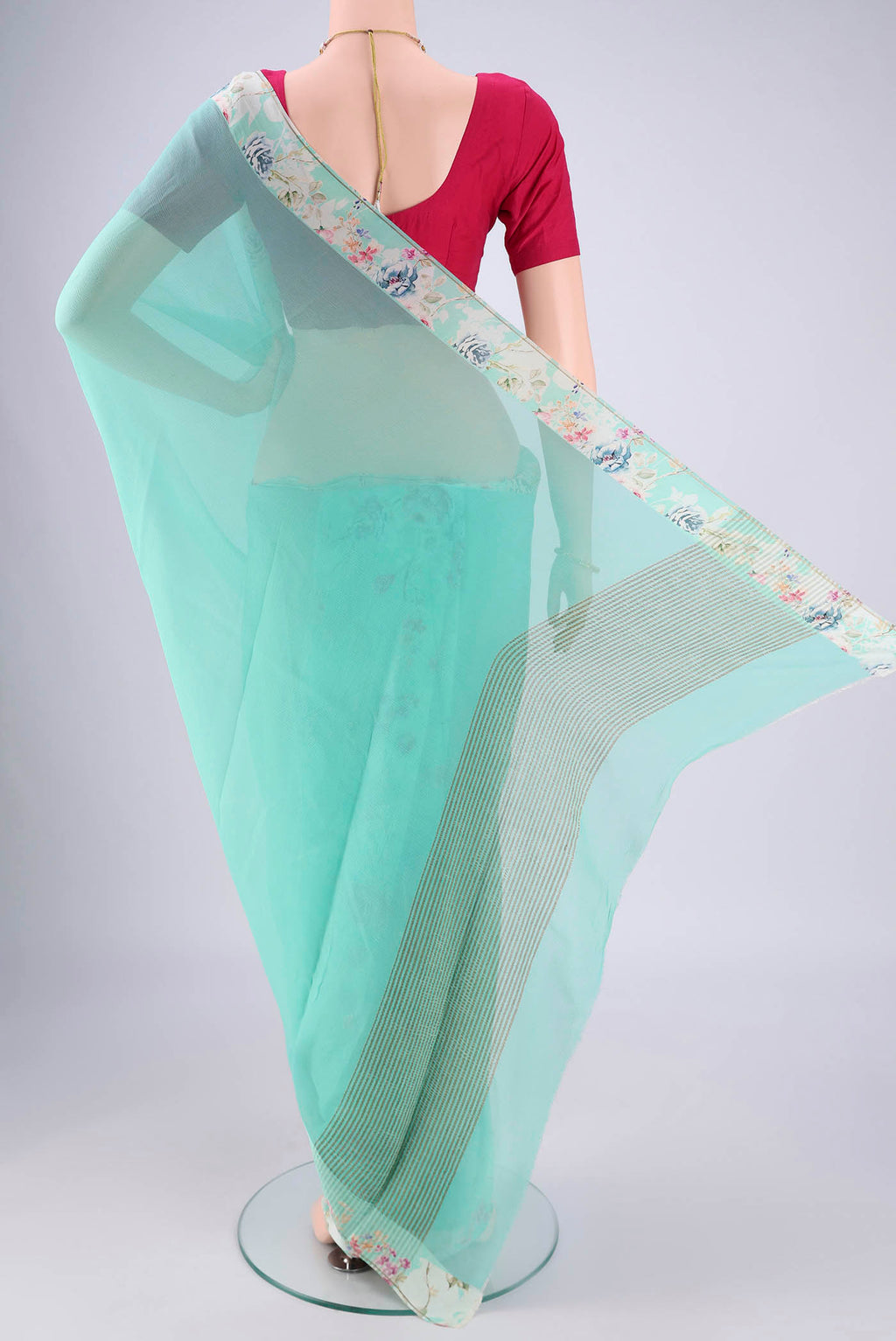 Flat view of Turquoise Mysore Chiffon Saree with Plain Body and Printed Border. 