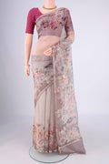 Grey Kota Silk Saree with Floral Print on the body and Zari Border.  displayed on a mannequin