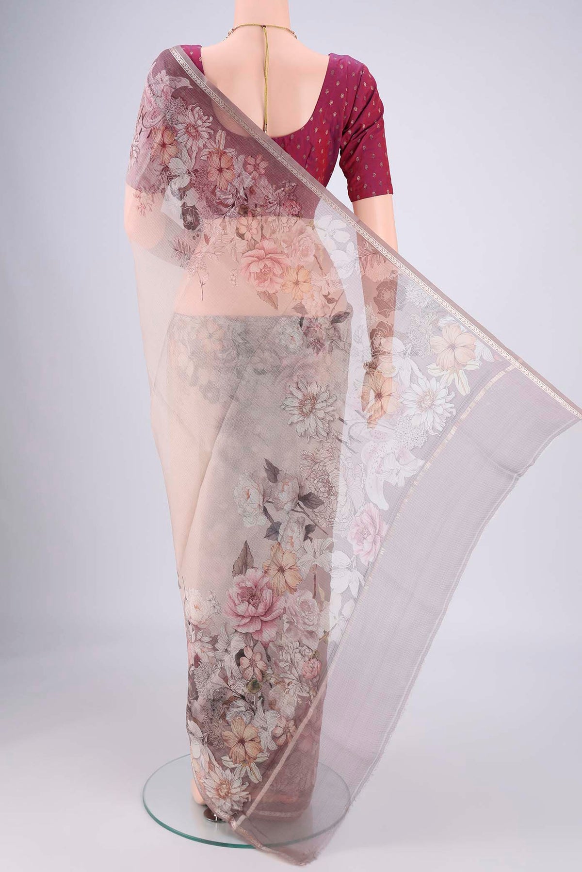 Flat view of Grey Kota Silk Saree with Floral Print on the body and Zari Border. 