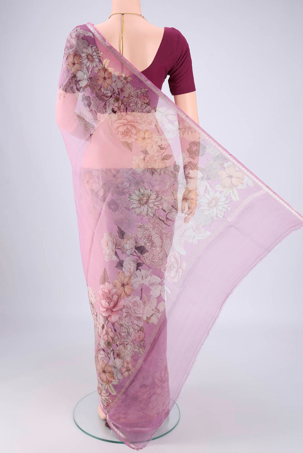 Flat view of Lilac Kota Silk Saree with Floral Print on the body and Zari Border. 