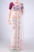 Pearl White Kota Silk Saree with Floral Print on the body and Zari Border.  displayed on a mannequin