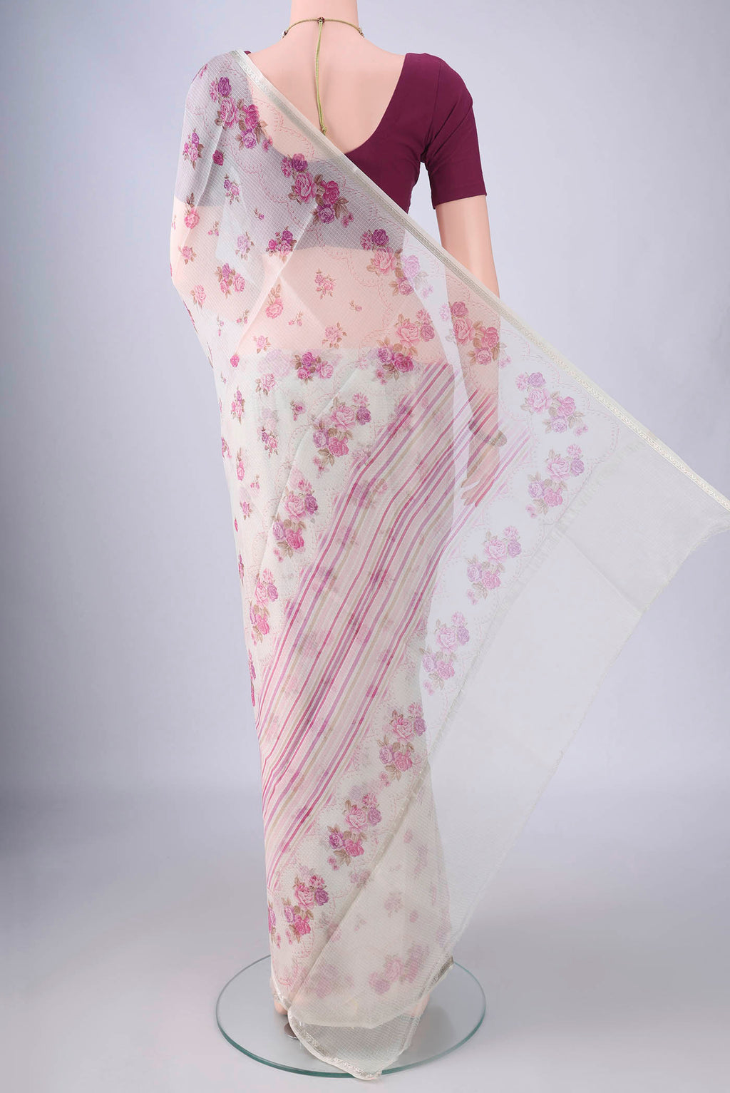 Flat view of Pearl White Kota Silk Saree with Floral Print on the body and Zari Border. 