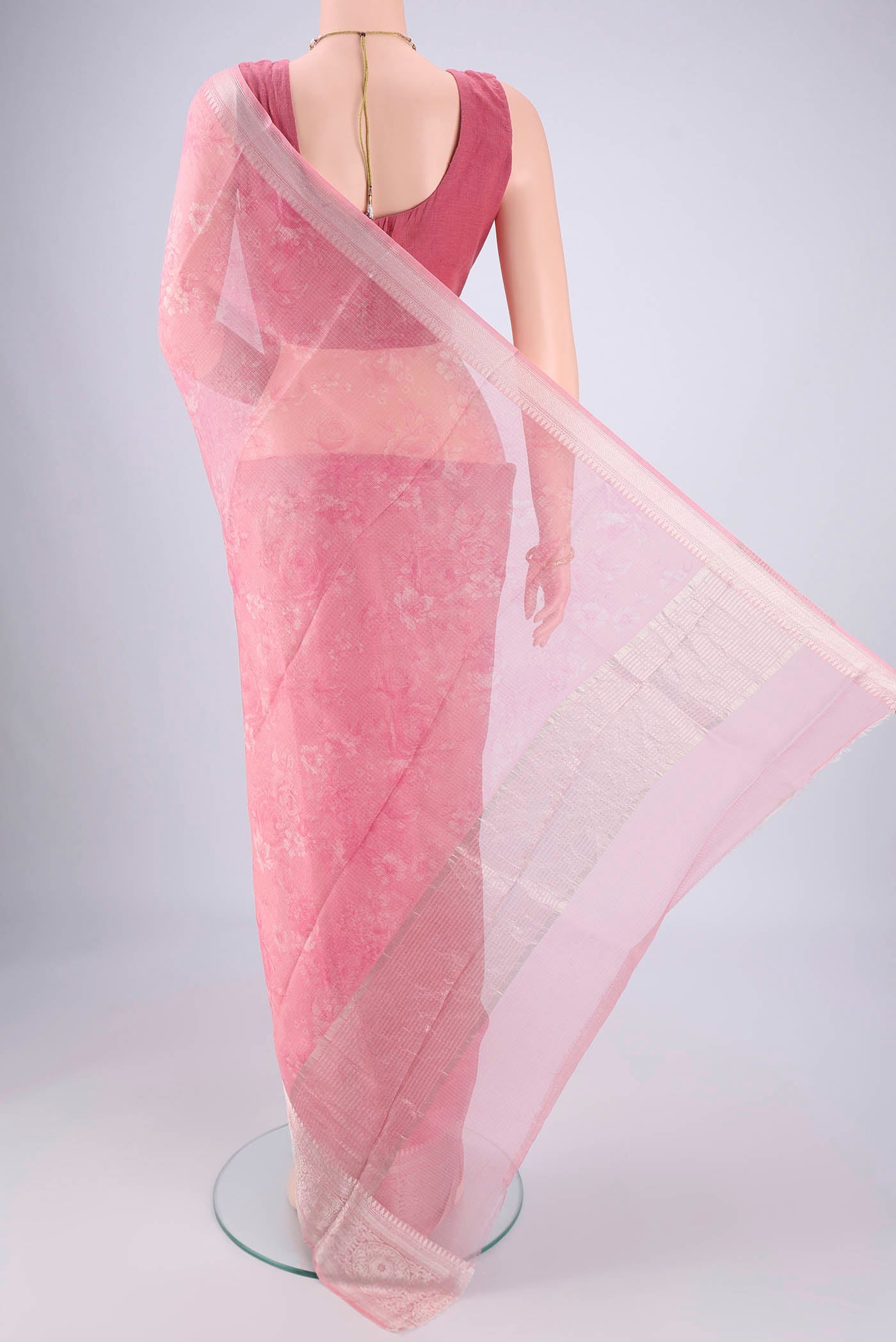 Flat view of Rose pink Kota Silk Saree with Floral Print on the body and Zari Border. 