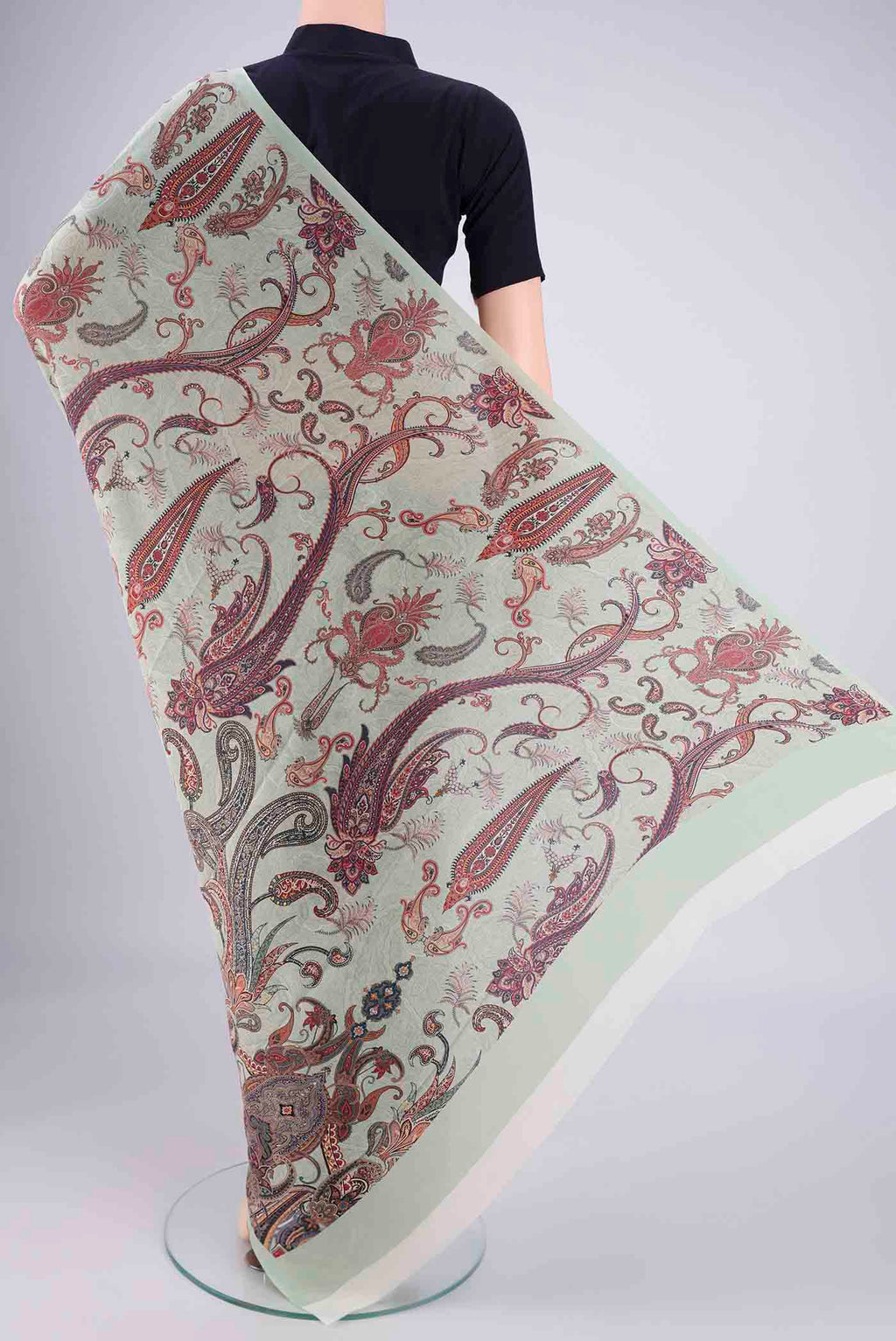 Flat view of Sage Green Mysore Crepe Saree with Printed design on the body and Printed Border. 