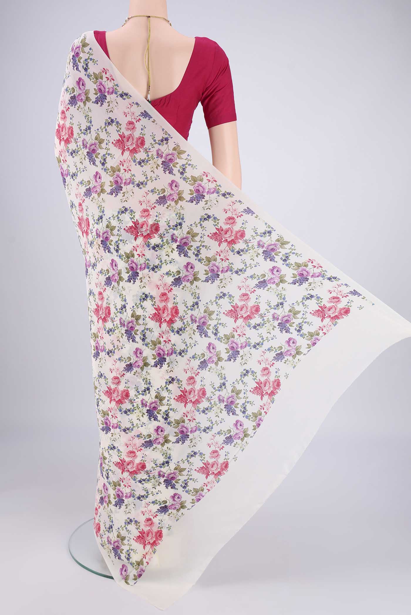 Flat view of White Mysore Crepe Saree with Printed design on the body and Printed Border. 