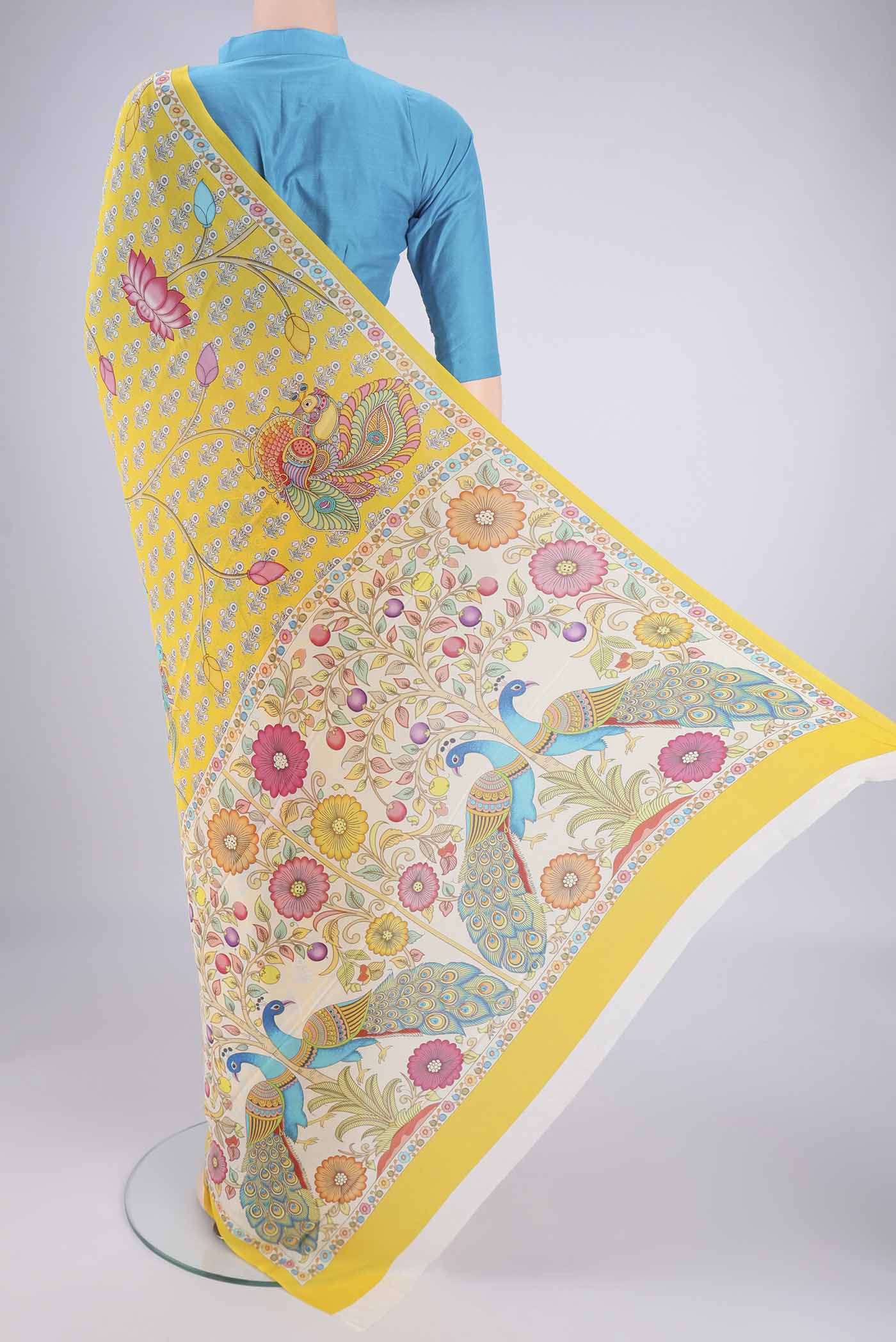 Flat view of Yellow Mysore Crepe Saree with Printed design on the body and Printed Border. 