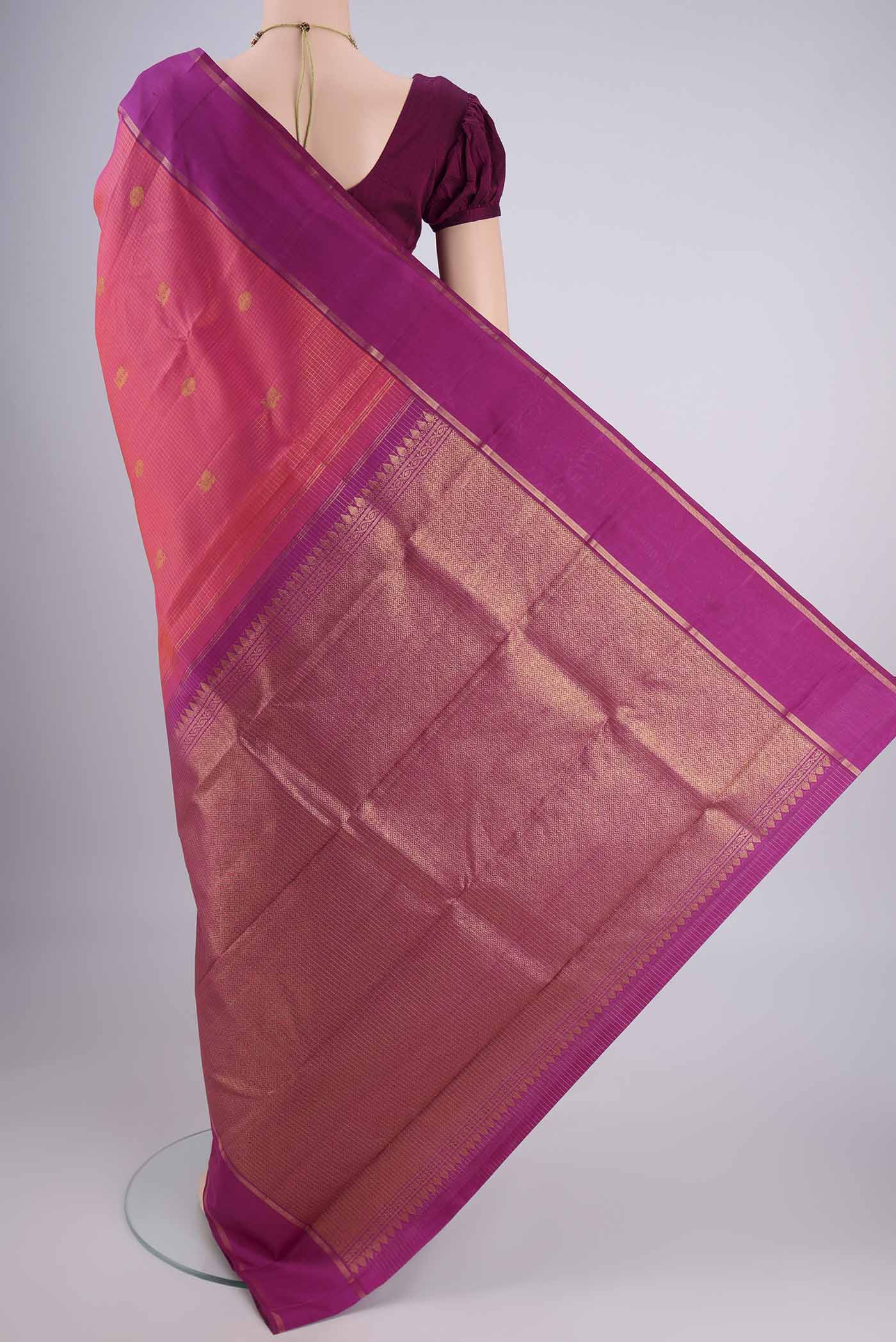 Flat view of Pink with Orange Color Kanjivaram Silk Saree with Checked design on the body and Zari Border. 
