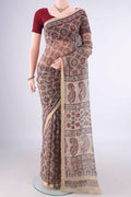 Off White Kota Cotton Saree with Ajrakh Print on the body and Zari Border.  displayed on a mannequin