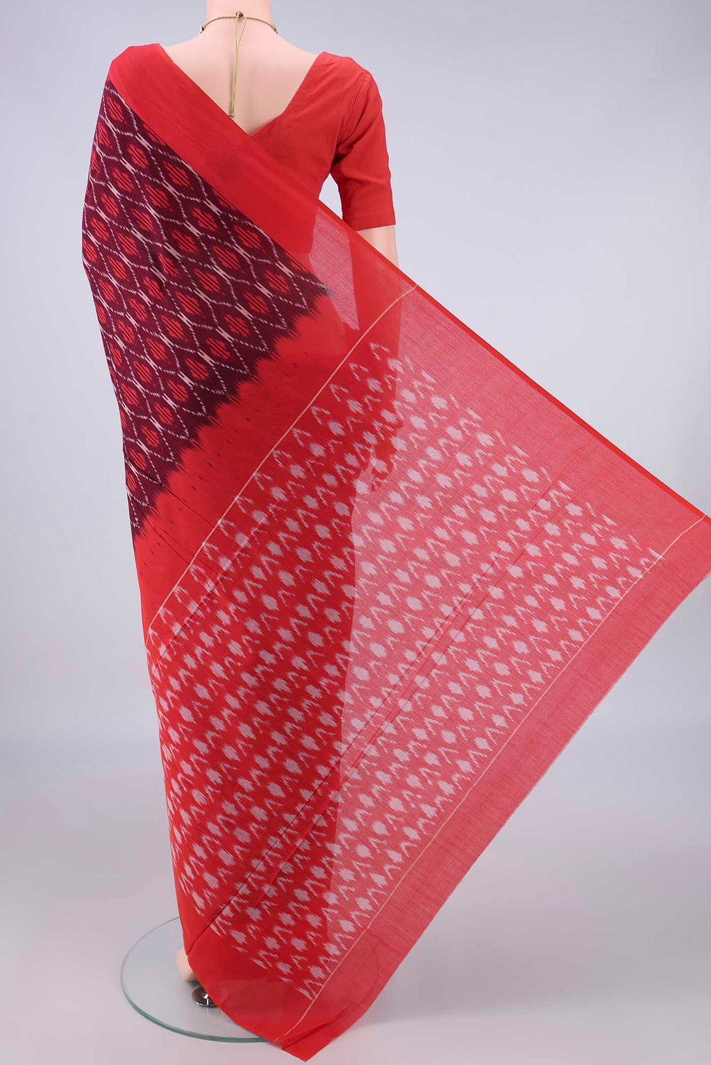 Flat view of Purple Pochampally Cotton Saree with Ikat design on the body and Ikat Border. 