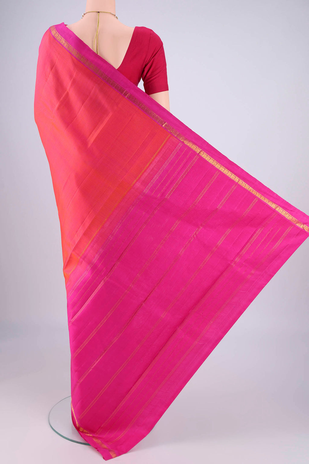 Flat view of Pink with Orange Color Kanjivaram Silk Saree with Plain Body and Zari Border. 