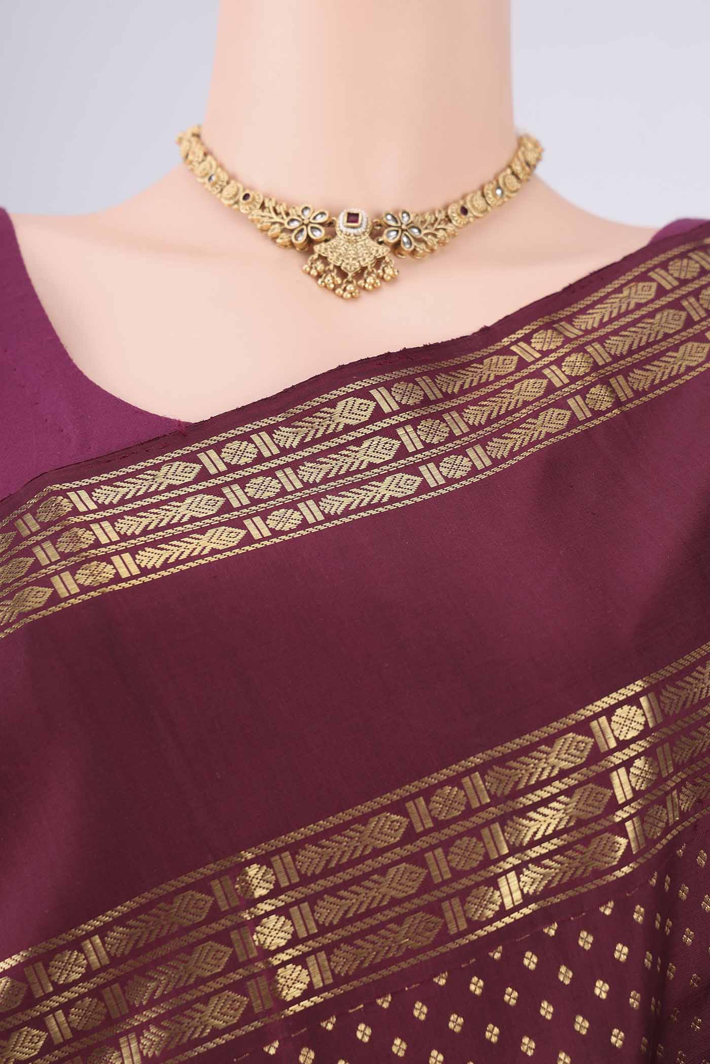 Border image of Pure Silk Pure Zari Maroon Kanjivaram Saree with Zari Butta on the body and Zari Border. 