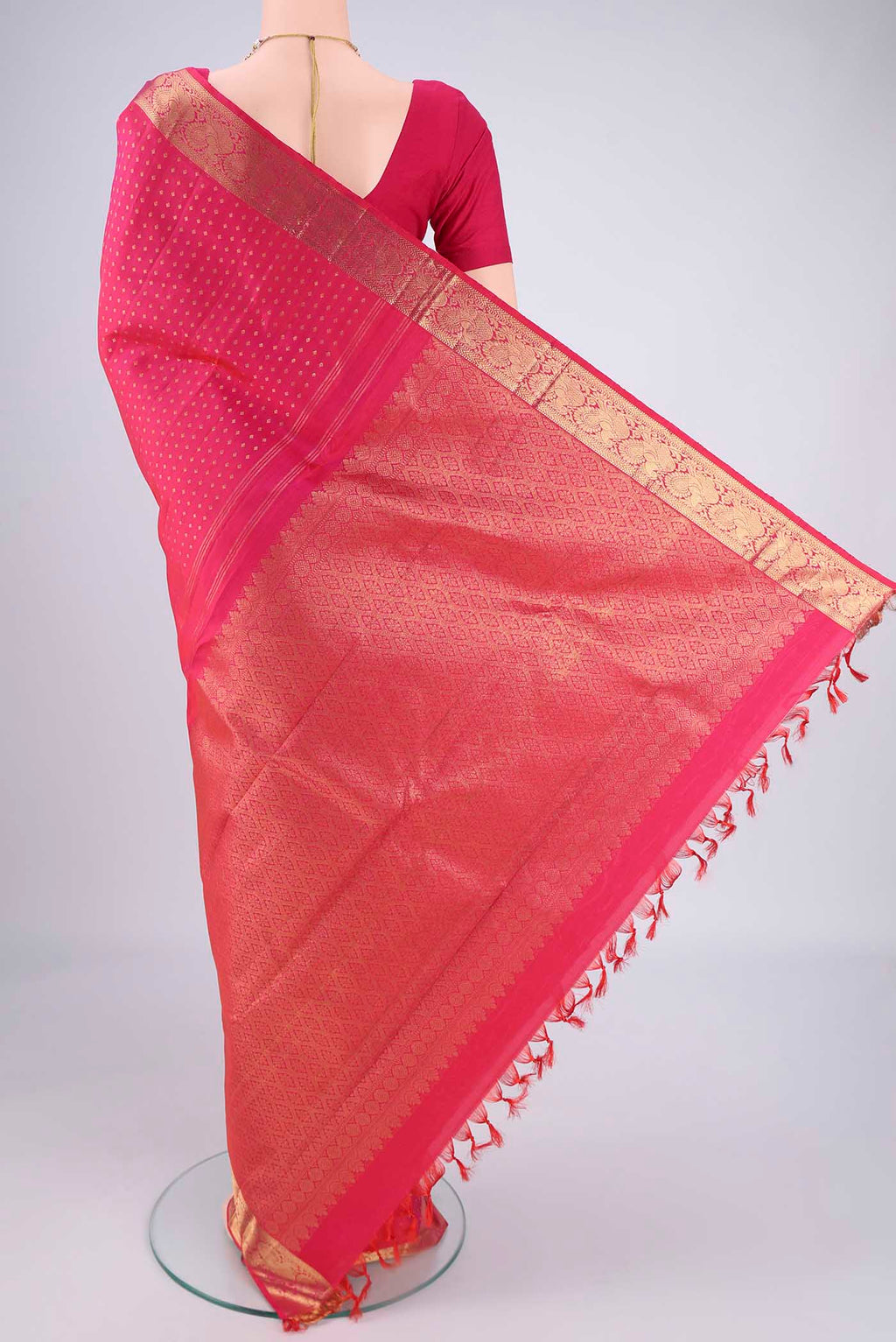 Flat view of Dark Pink Dual Tone Kanjivaram Silk Saree with Zari Butta on the body and Zari Border. 