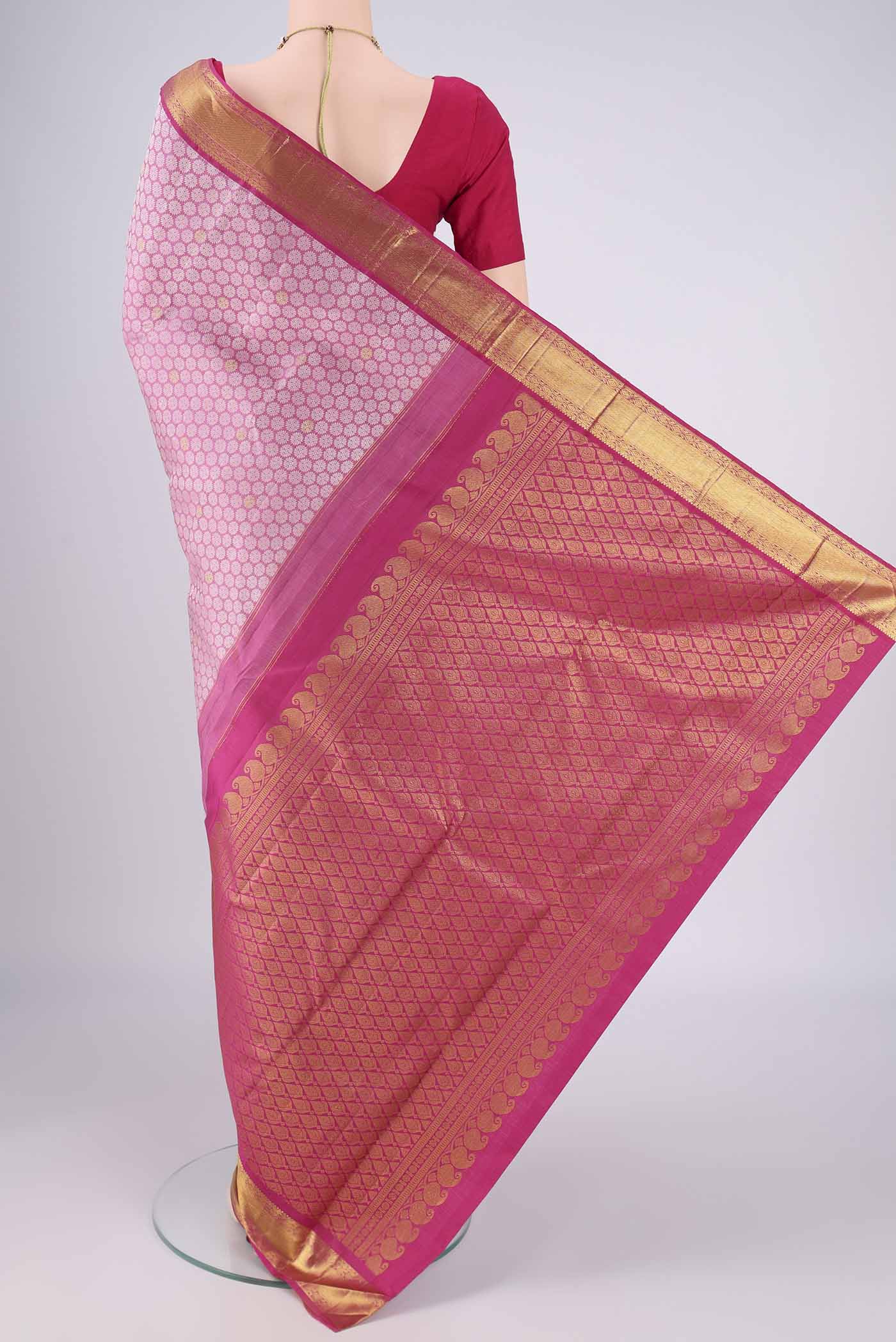 Flat view of Rose pink Kanjivaram Silk Saree with Jacquard With Zari Butta on the body and Zari Border. 