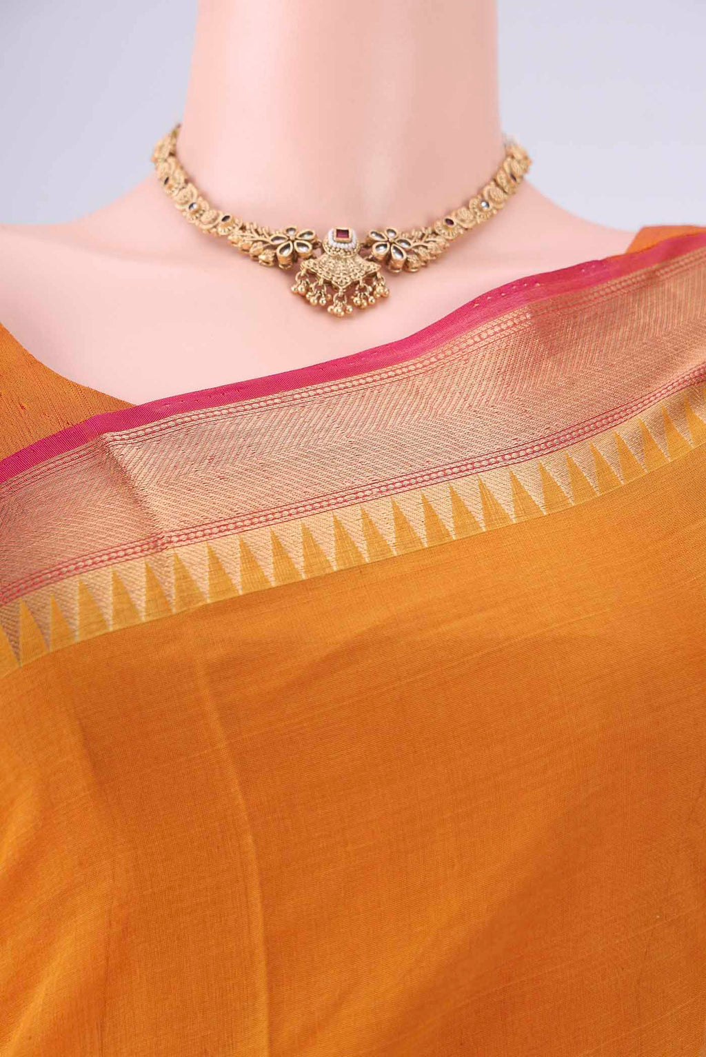 Border image of Mustard Kora Cotton Saree with Zari Butta on the body and Zari Border. 