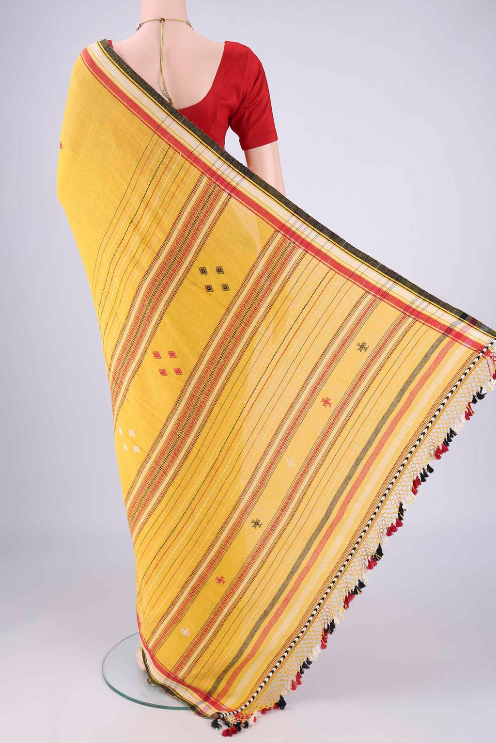 Flat view of Gold with Red Dual Tone Khadi Cotton Saree with Thread Butta on the body and Plain Border. 