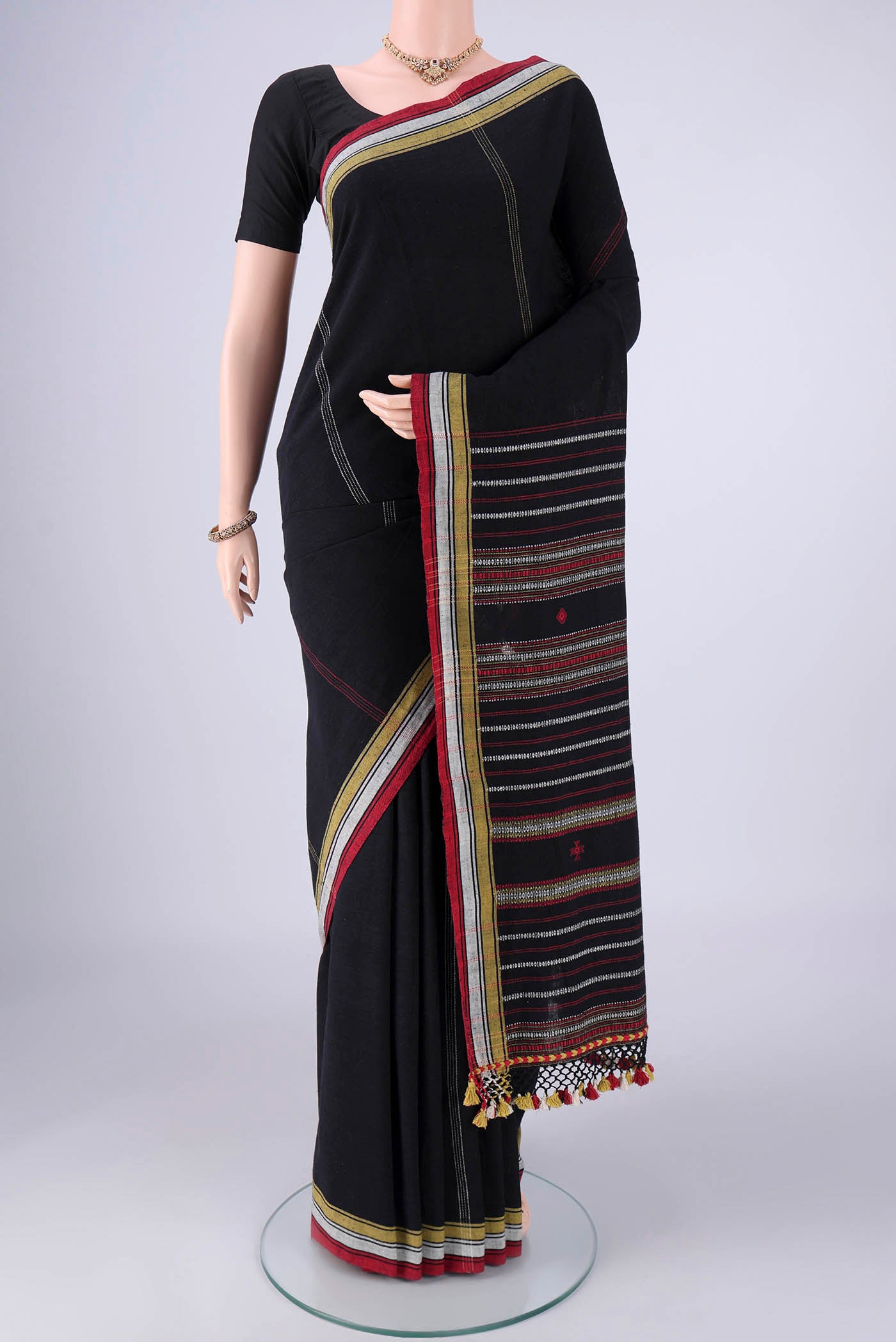 Gold with Red Dual Tone Khadi Cotton Saree with Stripes on the body and Plain Border.  displayed on a mannequin