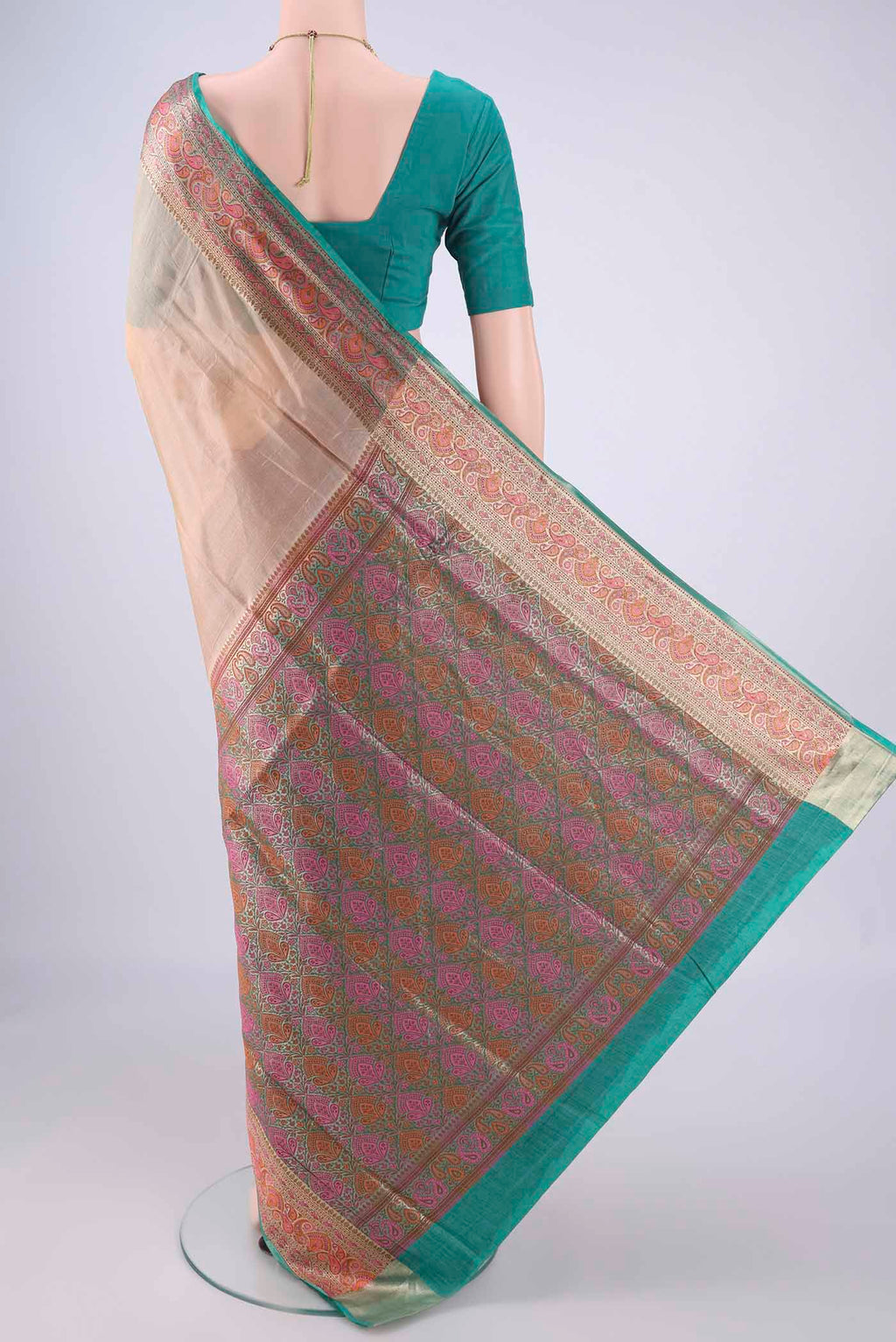 Flat view of Beige Banarasi Tussar Silk Saree with Plain Body and Zari Border. 