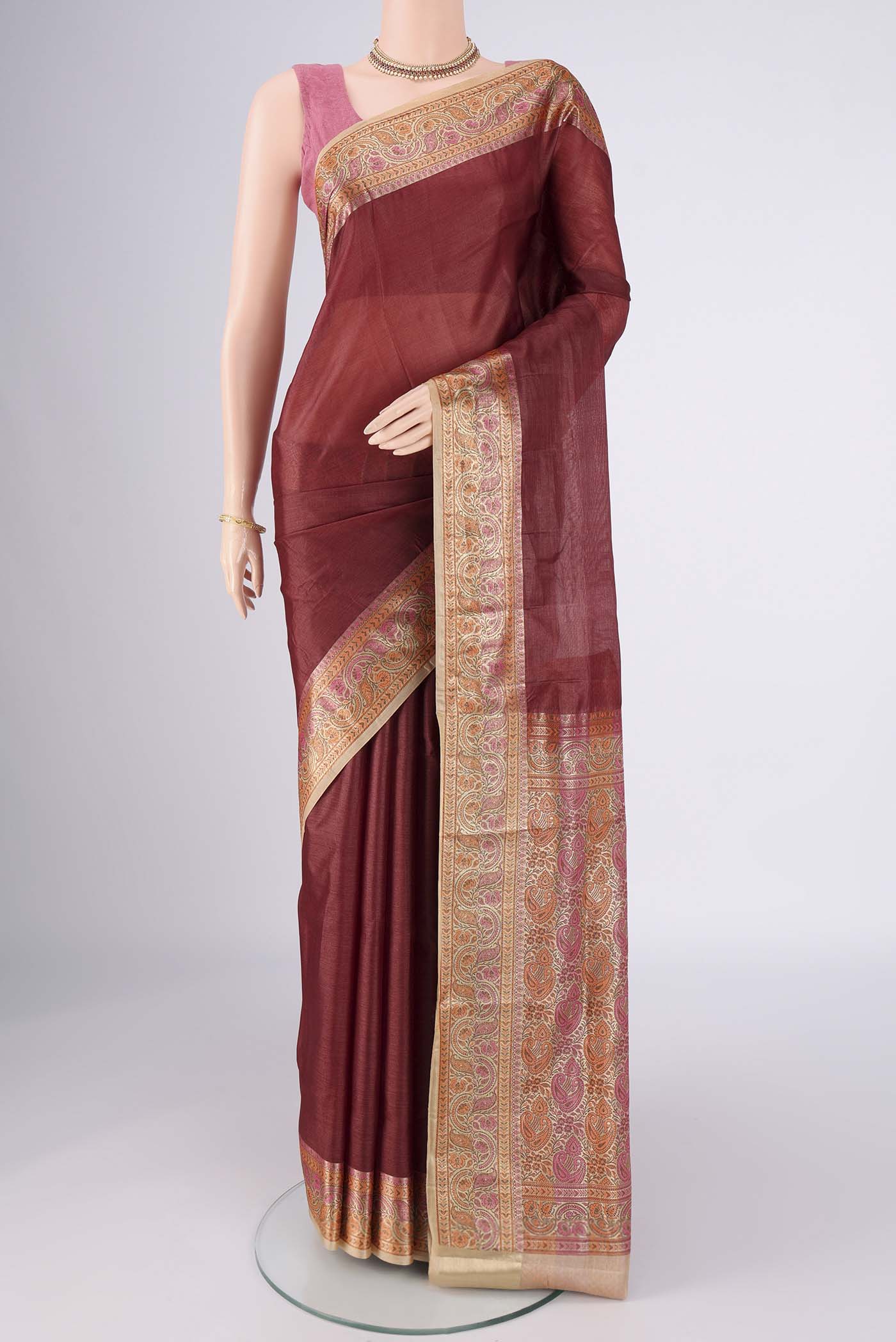 Brown Banarasi Tussar Silk Saree with Plain Body and Zari Border.  displayed on a mannequin