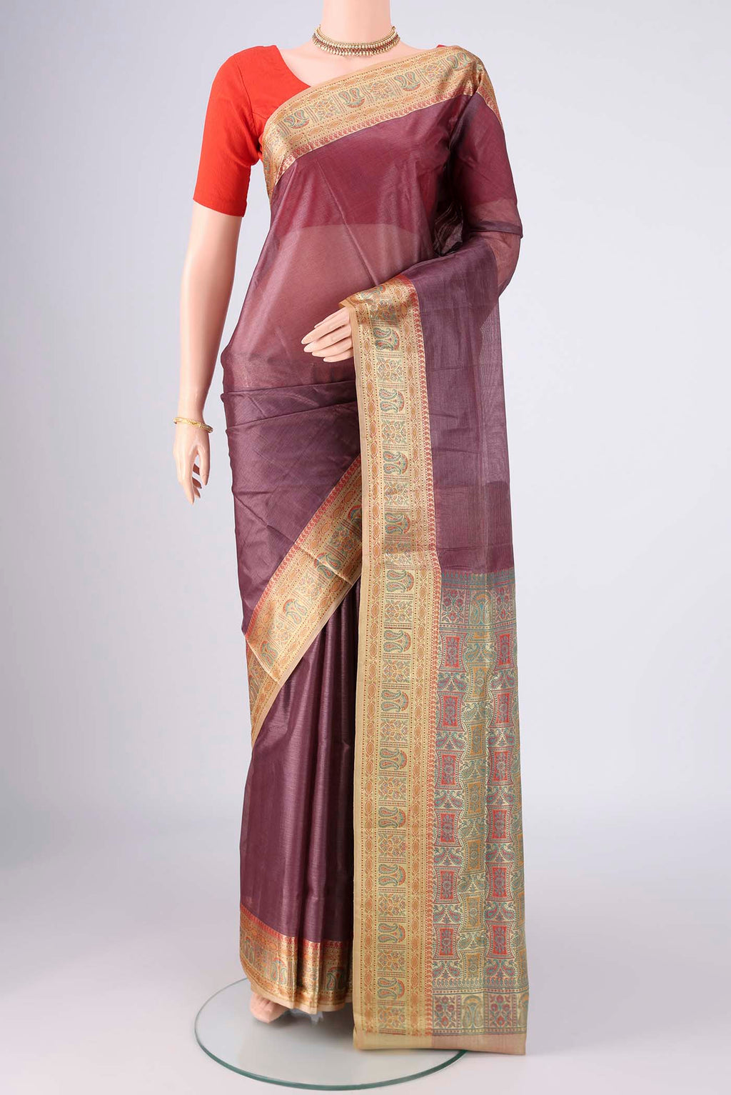 Dark Mauve Banarasi Tussar Silk Saree with Plain Body and Zari Border.  displayed on a mannequin