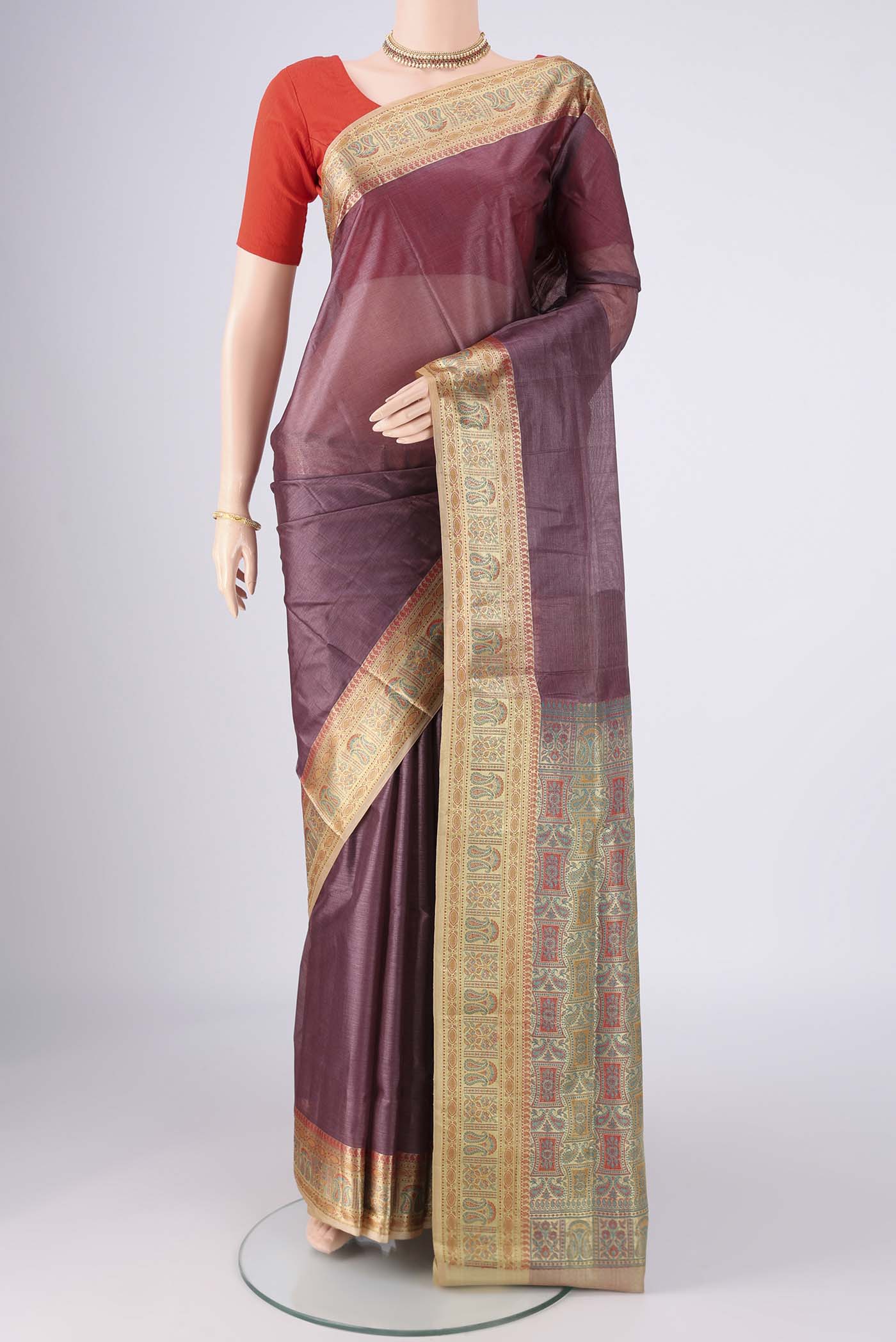 Dark Mauve Banarasi Tussar Silk Saree with Plain Body and Zari Border.  displayed on a mannequin