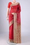 Red Banarasi Tussar Silk Saree with Embroidery on the body and Zari Border.  displayed on a mannequin