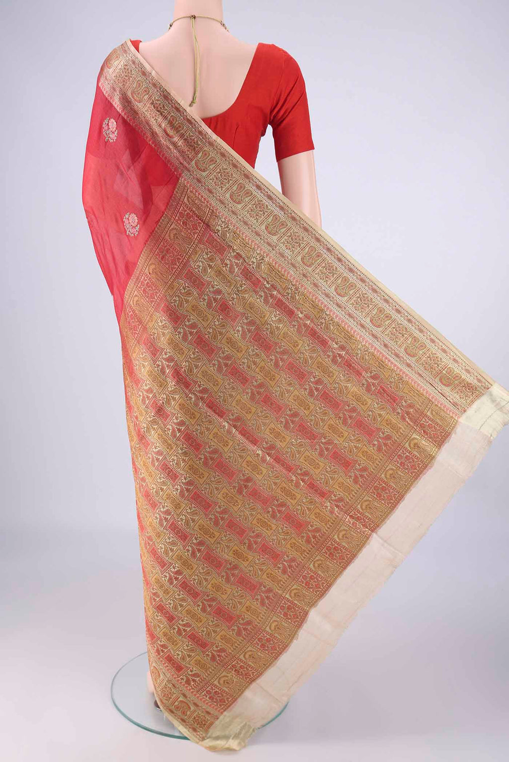 Flat view of Red Banarasi Tussar Silk Saree with Embroidery on the body and Zari Border. 