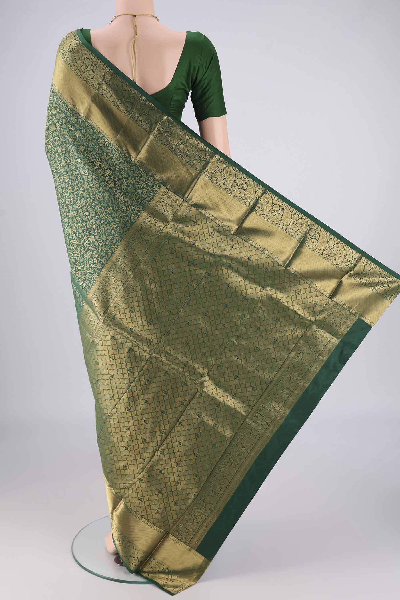 Flat view of Bottle Green Bangalore Silk Saree with Zari Brocade on the body and Zari Border. 