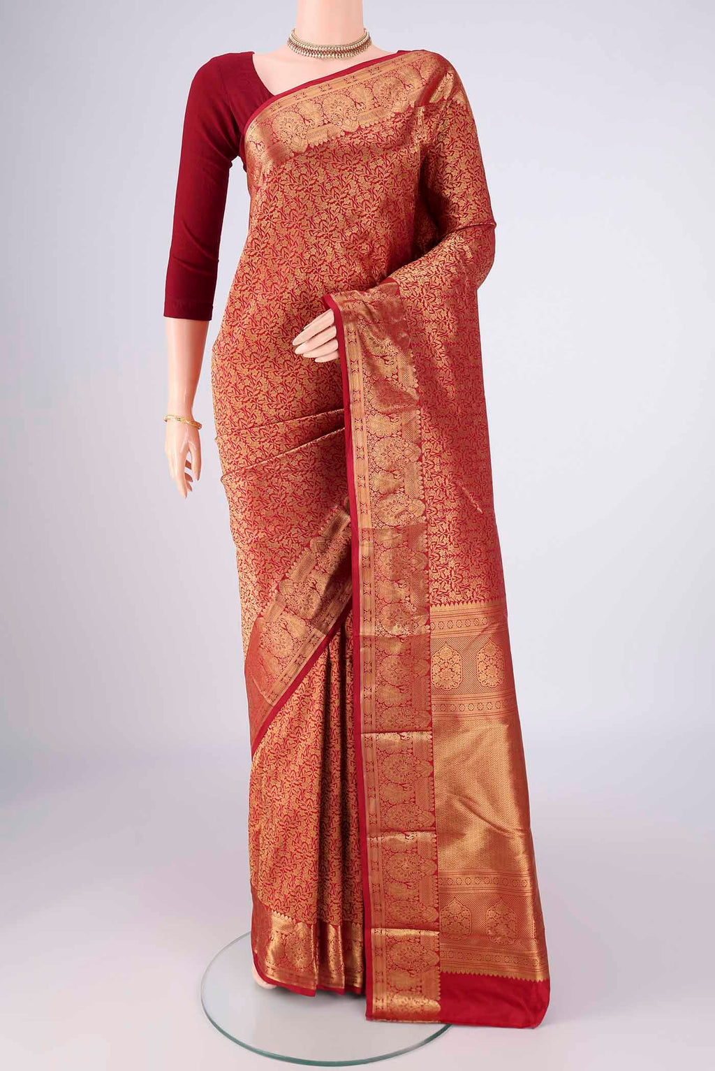 Maroon Bangalore Silk Saree with Zari Brocade on the body and Zari Border.  displayed on a mannequin