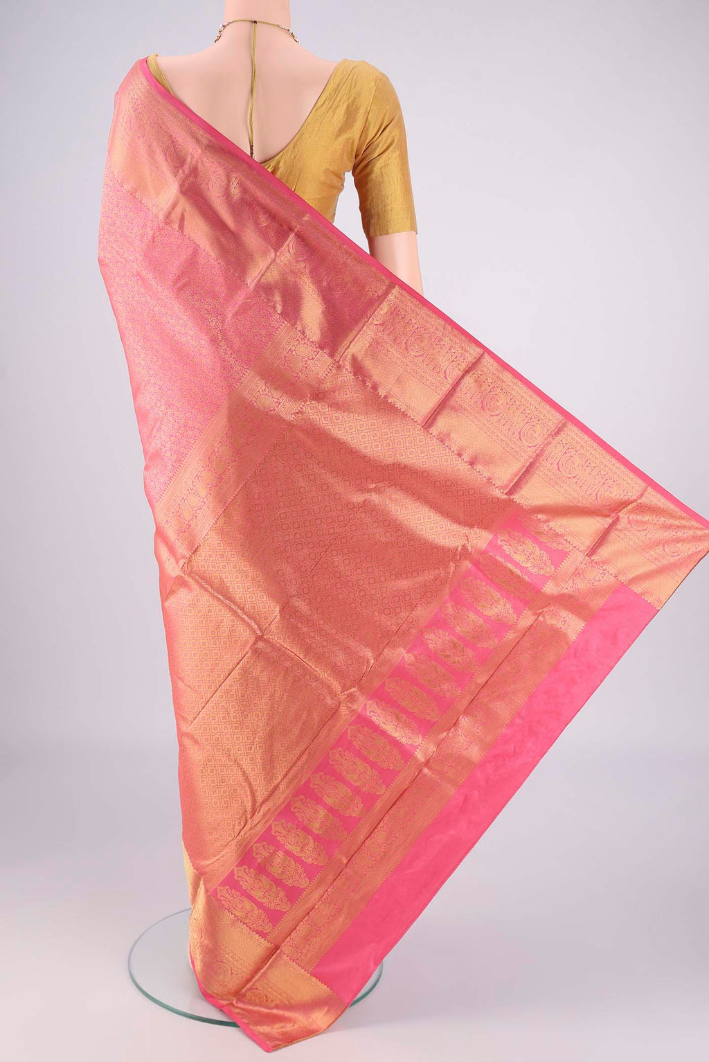 Flat view of Pink Bangalore Silk Saree with Zari Brocade on the body and Zari Border. 