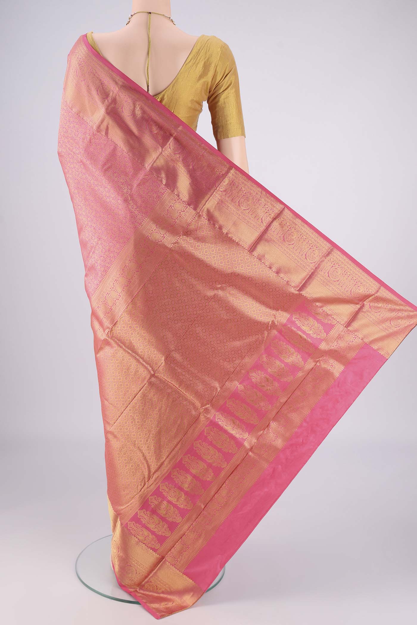 Flat view of Pink Bangalore Silk Saree with Zari Brocade on the body and Zari Border. 