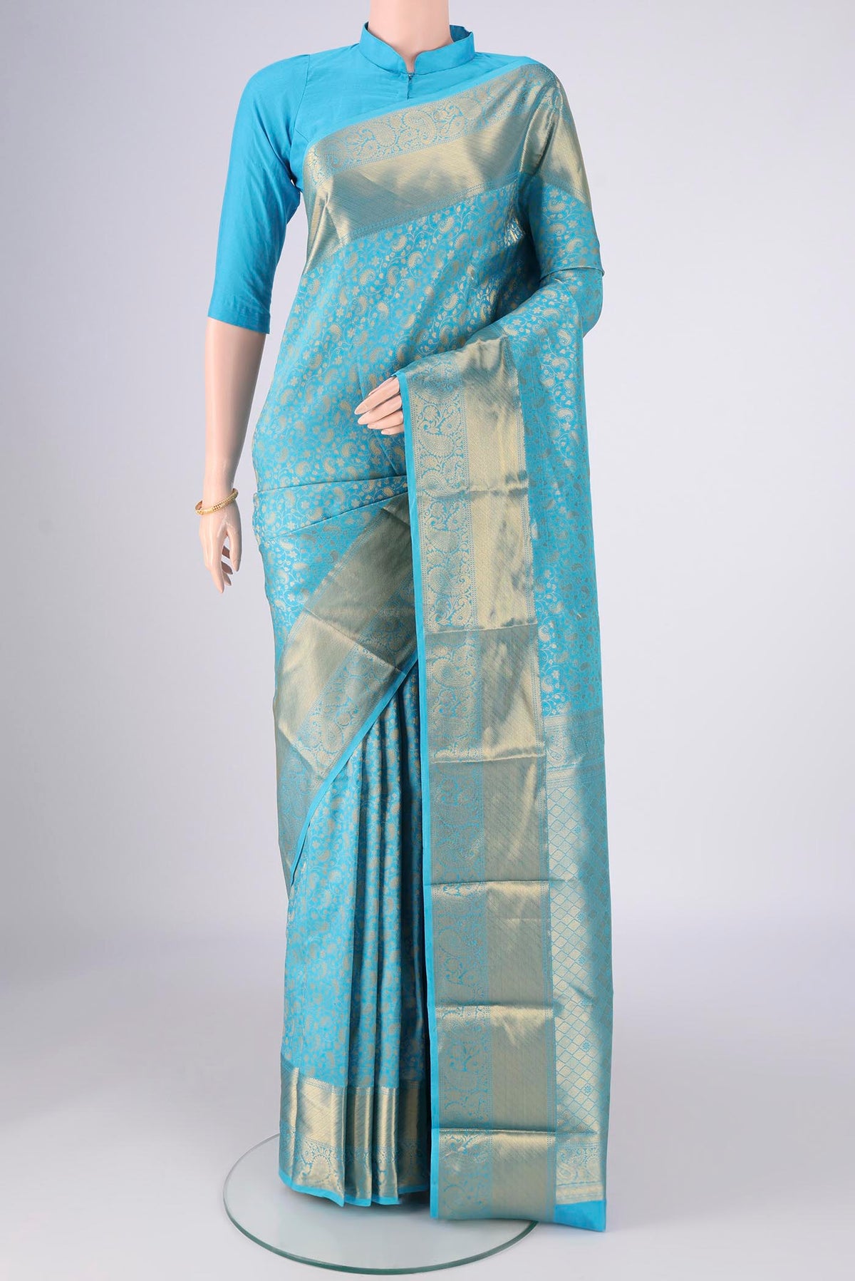 Sky Blue Bangalore Silk Saree with Zari Brocade on the body and Zari Border.  displayed on a mannequin