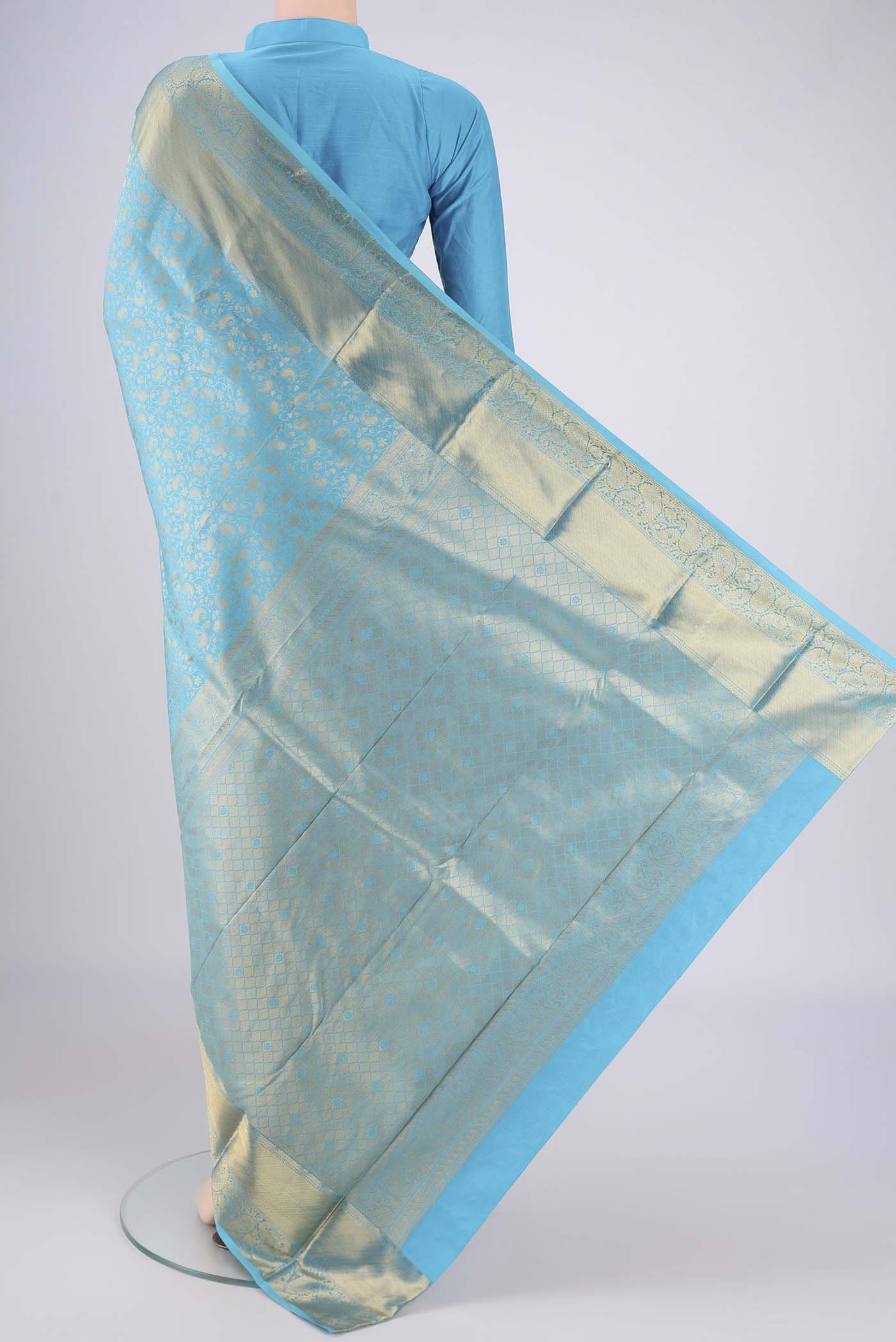 Flat view of Sky Blue Bangalore Silk Saree with Zari Brocade on the body and Zari Border. 