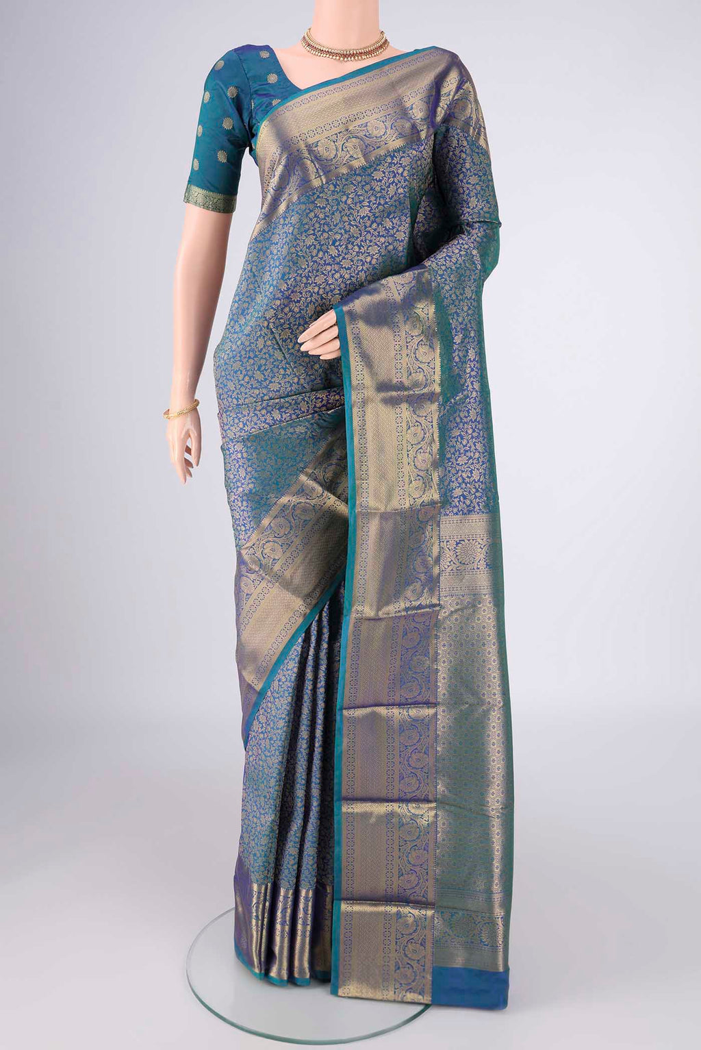Blue Dual Tone Bangalore Silk Saree with Zari Brocade on the body and Zari Border.  displayed on a mannequin