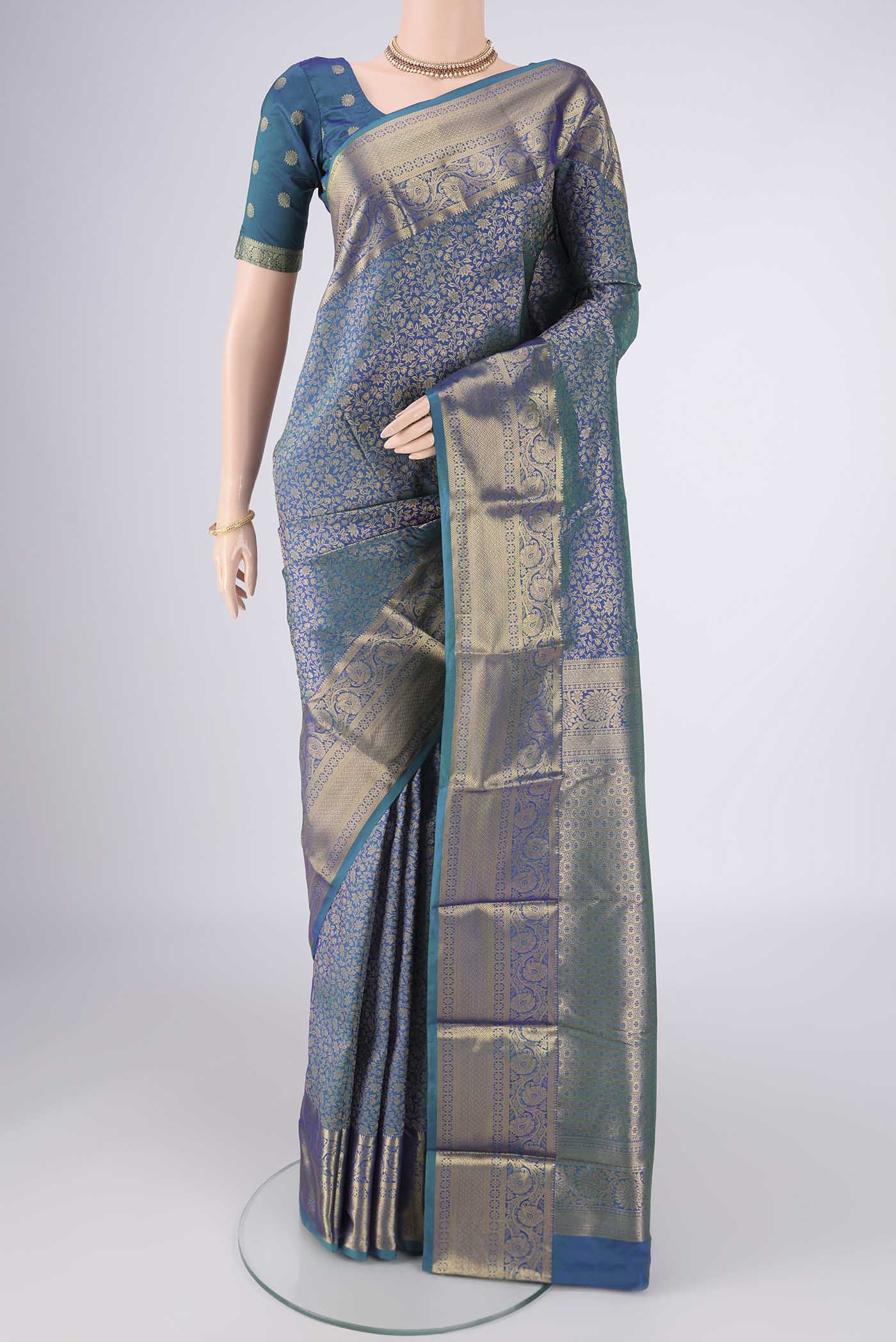 Blue Dual Tone Bangalore Silk Saree with Zari Brocade on the body and Zari Border.  displayed on a mannequin